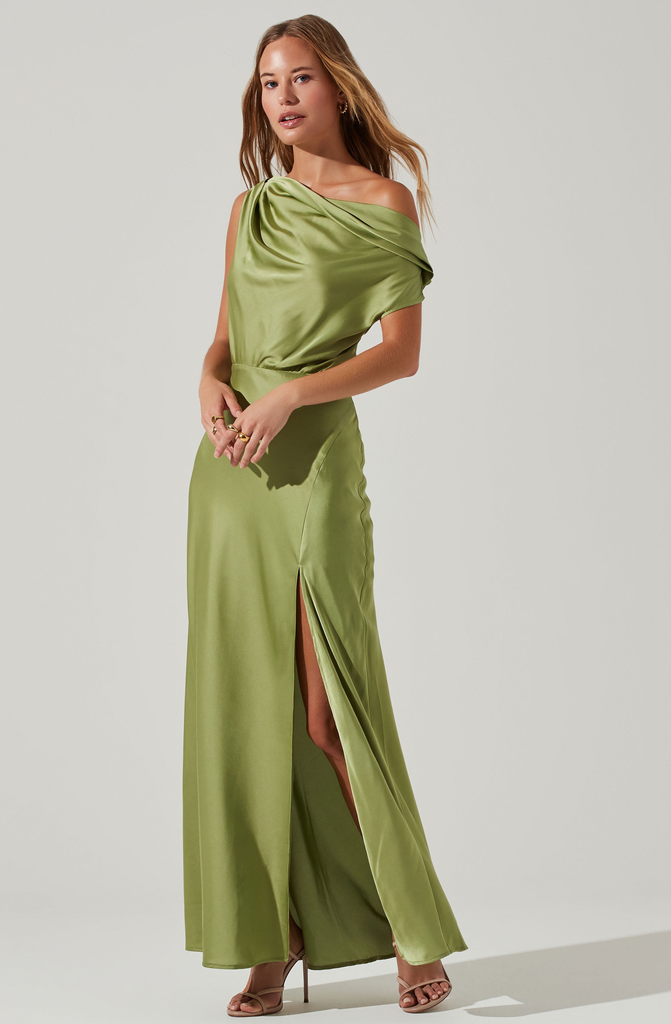 Green One Shoulder Flare Dress - This dress is ideal for a summer brunch. It emphasizes a one shoulder neckline that draws attention.