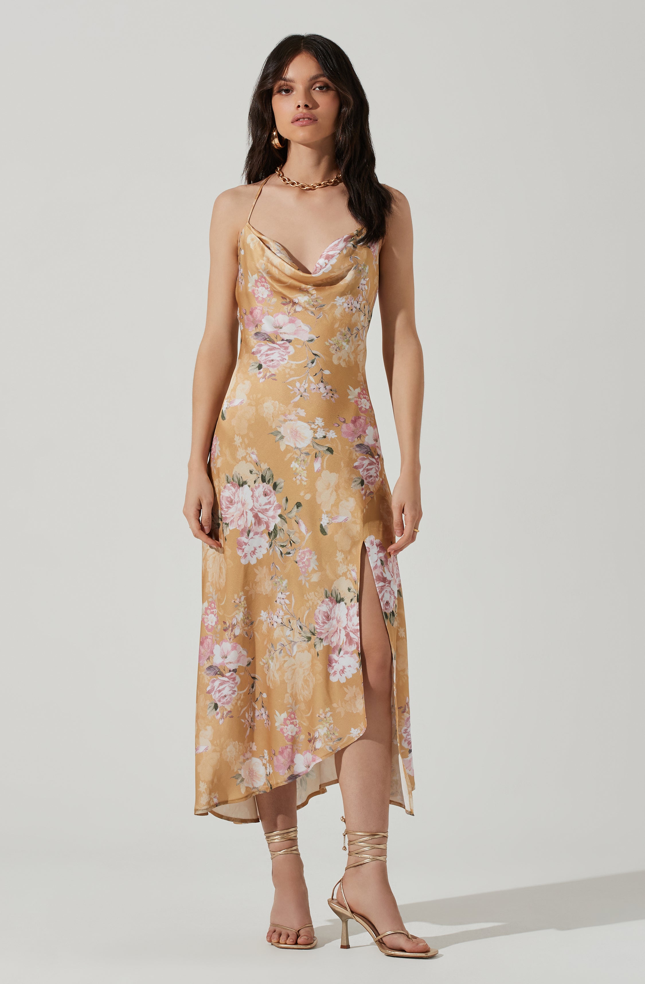 Brown Cowl Sheath Dress - This dress is a cool option to pull off your holiday look. It lays emphasis on an enticing cowl neck. Put together an elegant look, wearing this dress with a pair of pumps and accessorizing with a shoulder bag.