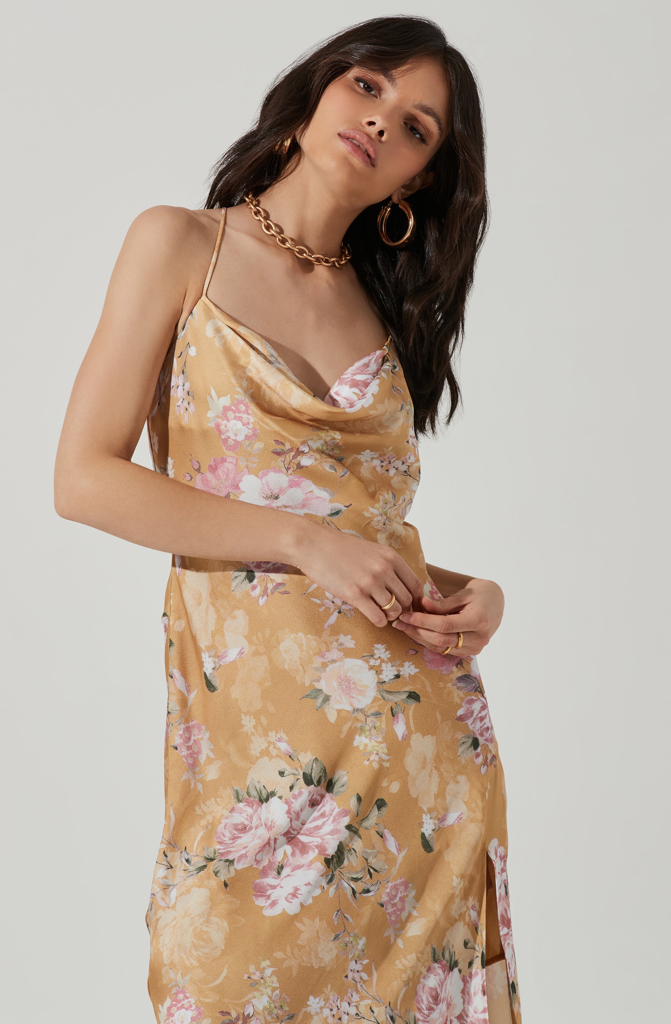 Brown Cowl Sheath Dress - This dress is a cool option to pull off your holiday look. It lays emphasis on an enticing cowl neck. Put together an elegant look, wearing this dress with a pair of pumps and accessorizing with a shoulder bag.