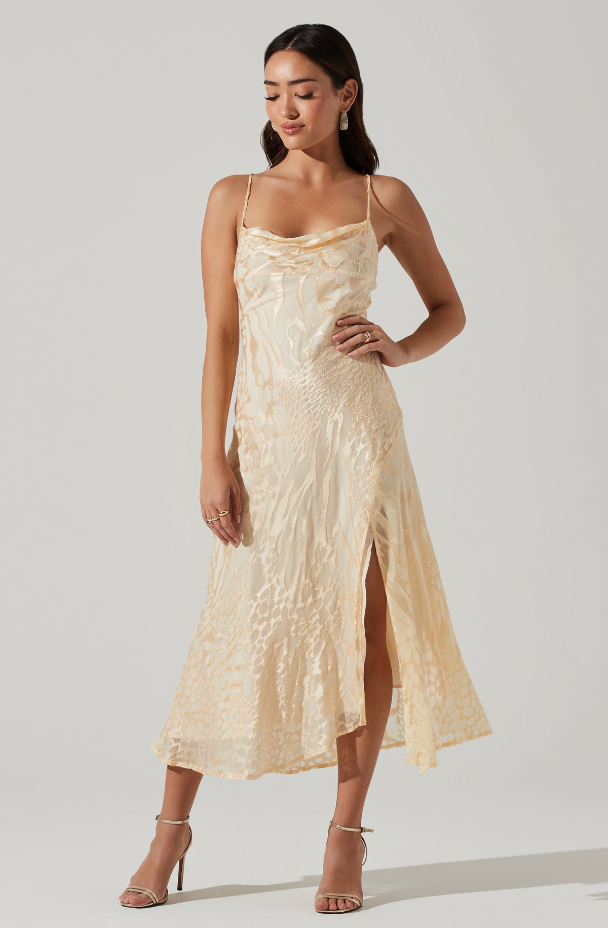 Cowl Flare Dress - Brunch is all about dressing light without compromising on style, and this dress achieves both of those. It emphasizes a modish cowl neck.