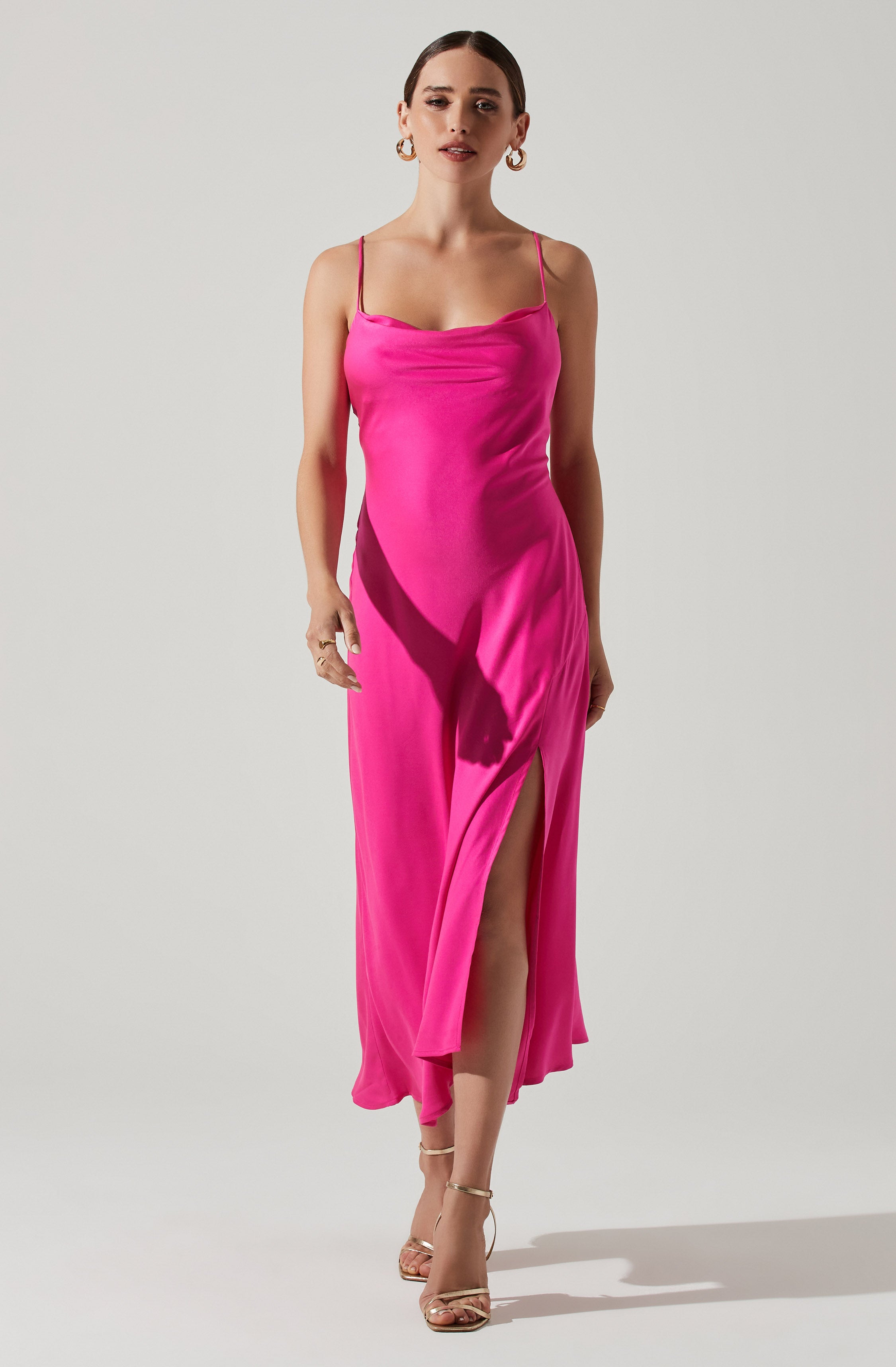Pink Sheath Dress - This dress offers all the glitz and glamor you'll ever need for those party nights. It emphasizes a modish cowl neck. Style this dress with a pair of sandals and a handbag.