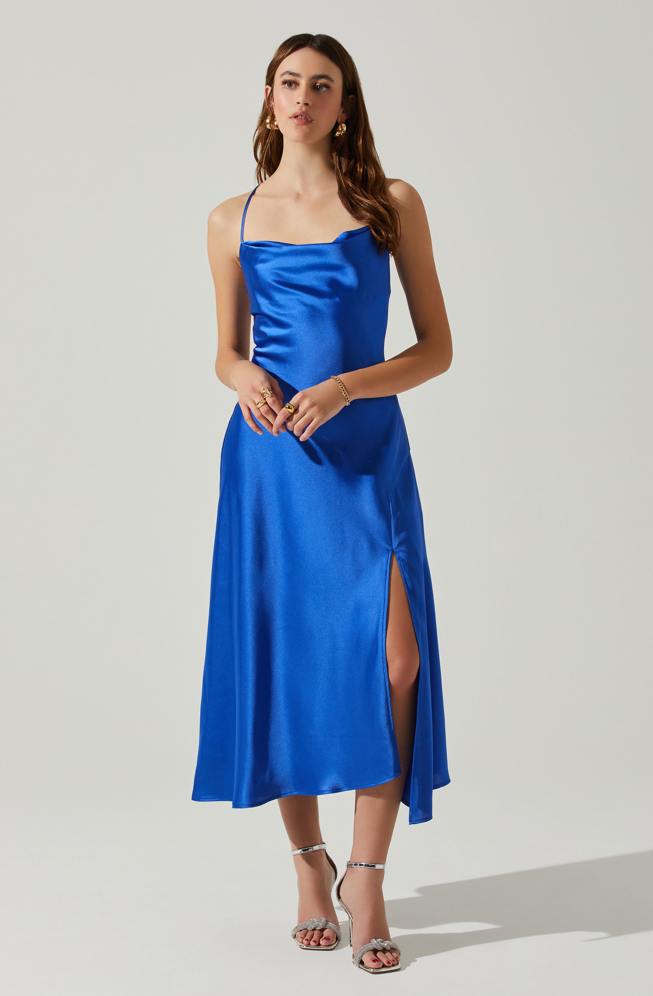 Blue Cowl Sheath Dress - This dress offers all the glitz and glamor you'll ever need for those party nights. It features an enticing cowl neck. This dress goes well with a pair of suede pumps and an envelope clutch.