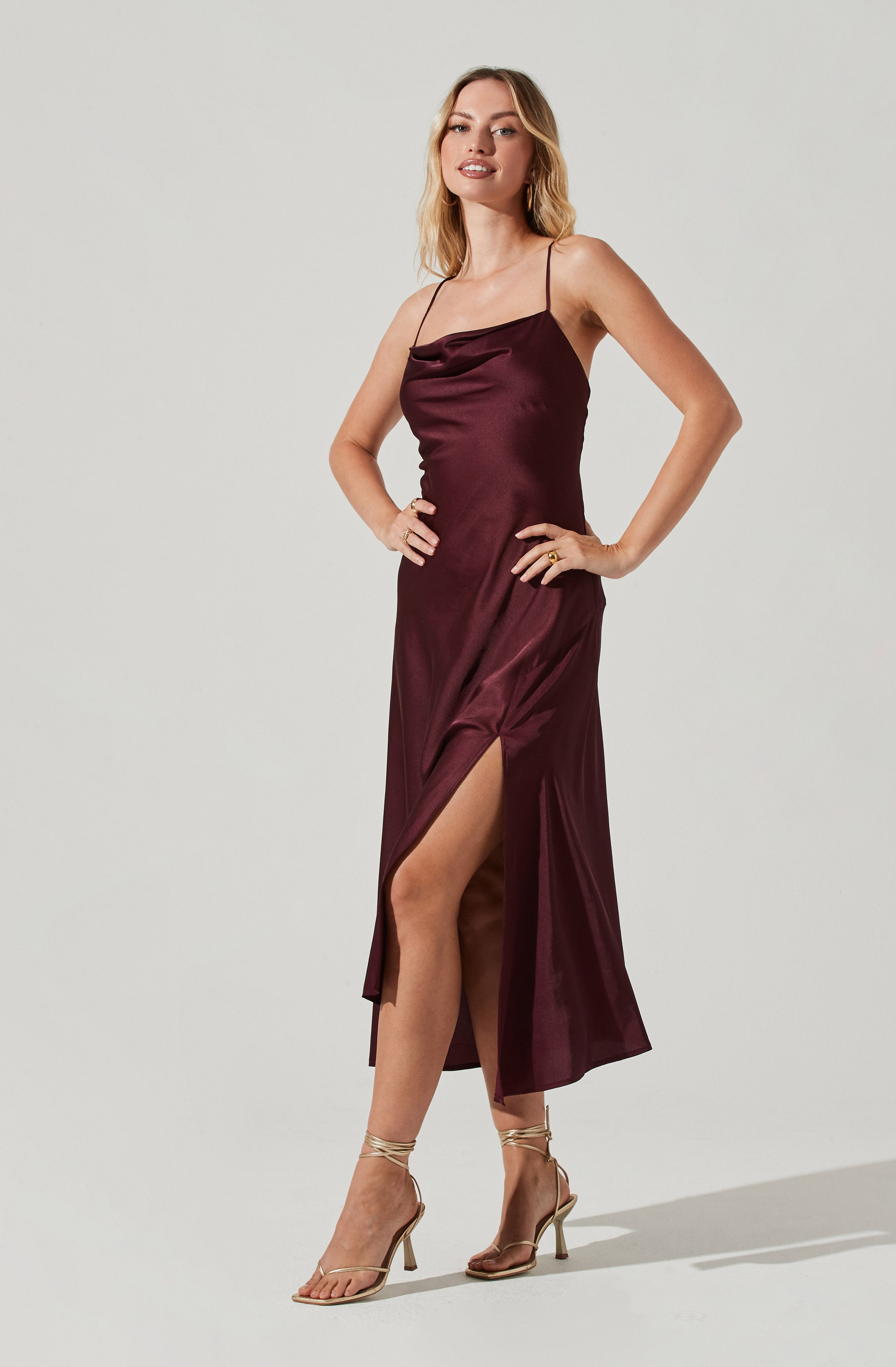 Cowl Sheath Dress - Sporting a distinct punk look, this dress is a style statement on its own. It has a modish cowl neck. Turn your style up a notch by pairing this gorgeous piece with a contrasting blazer and a pair of pumps.