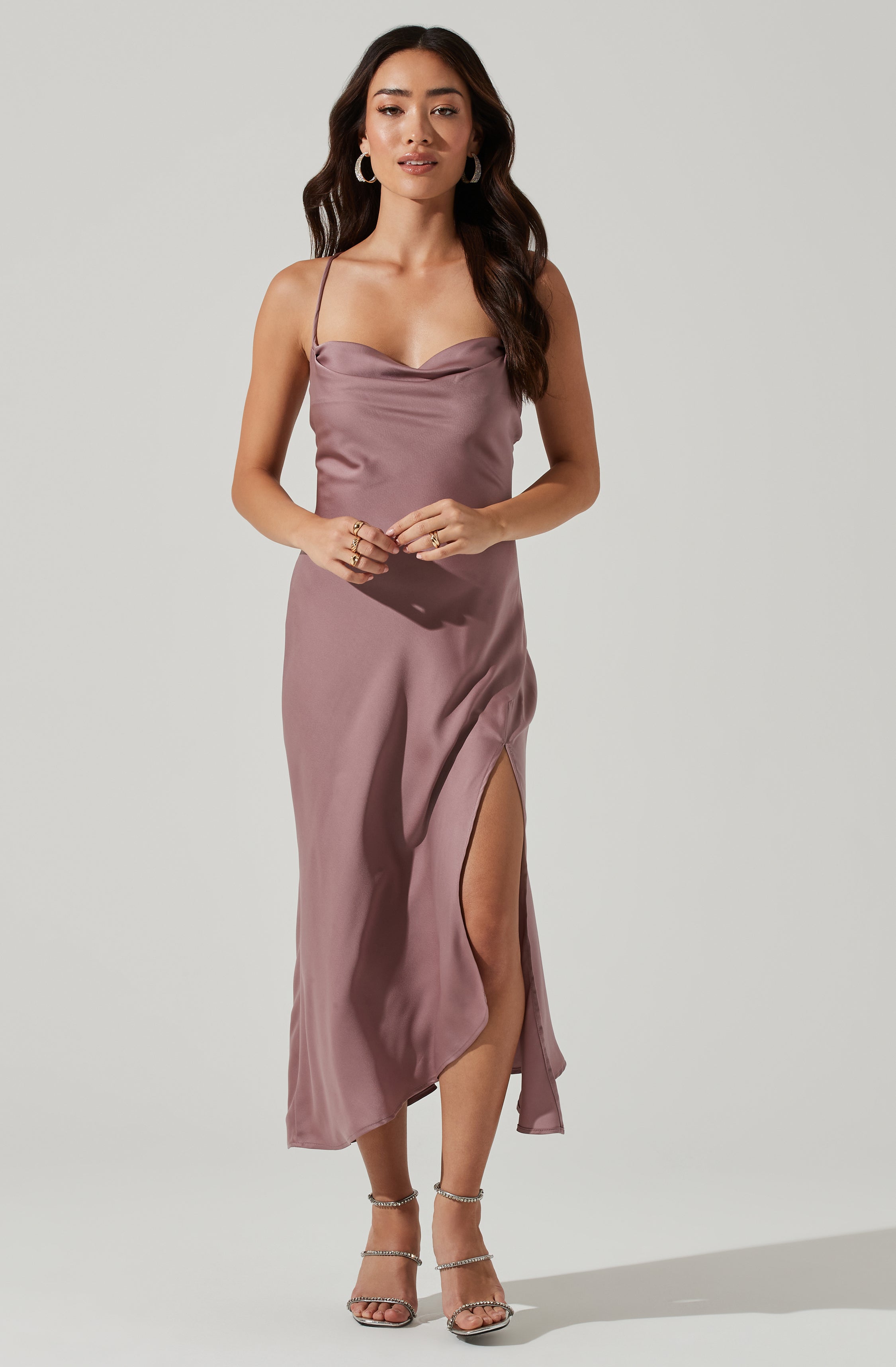 Brown Flare Dress - This dress is bold, retro, and fashionable, making it a must-have. It comes with a modish cowl neck.