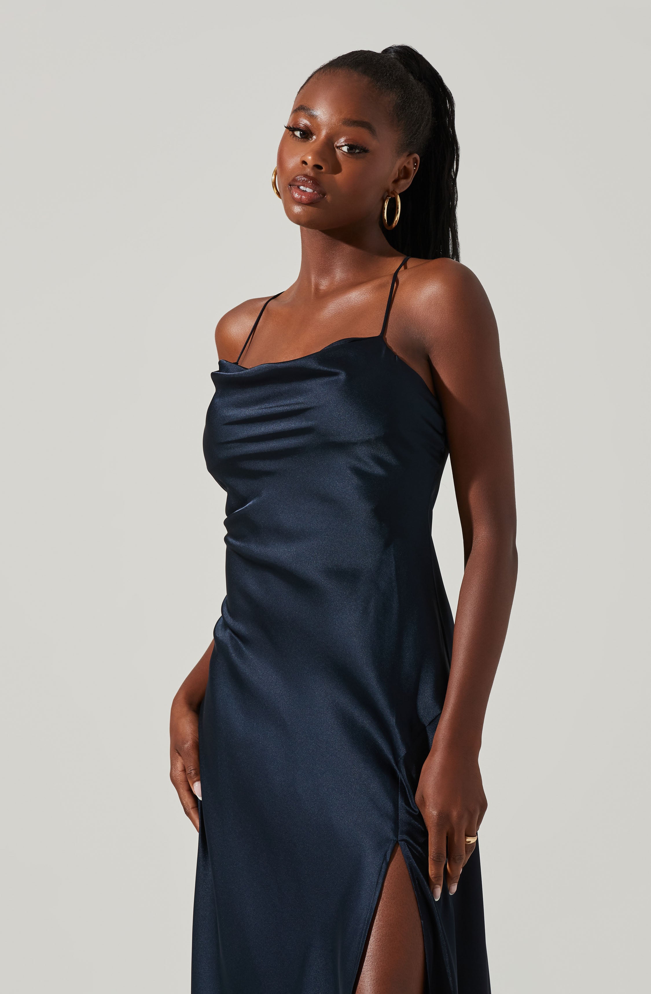 Cowl Sheath Dress - This dress is surely one of the more fashion forward options for your wardrobe. It flaunts an enticing cowl neck. Put together an elegant look, wearing this dress with a pair of pumps and accessorizing with a shoulder bag.