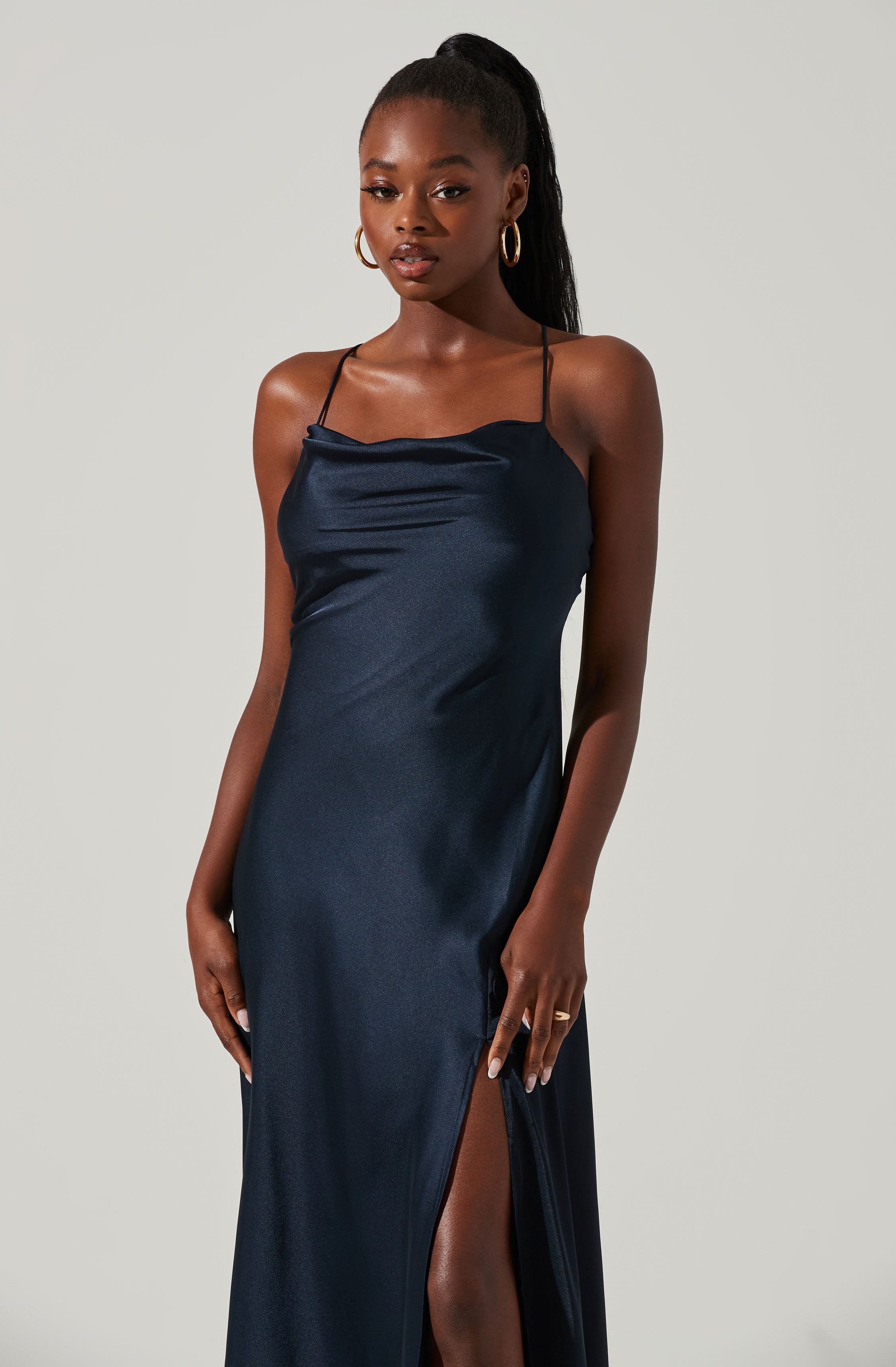 Cowl Sheath Dress - This dress is surely one of the more fashion forward options for your wardrobe. It flaunts an enticing cowl neck. Put together an elegant look, wearing this dress with a pair of pumps and accessorizing with a shoulder bag.