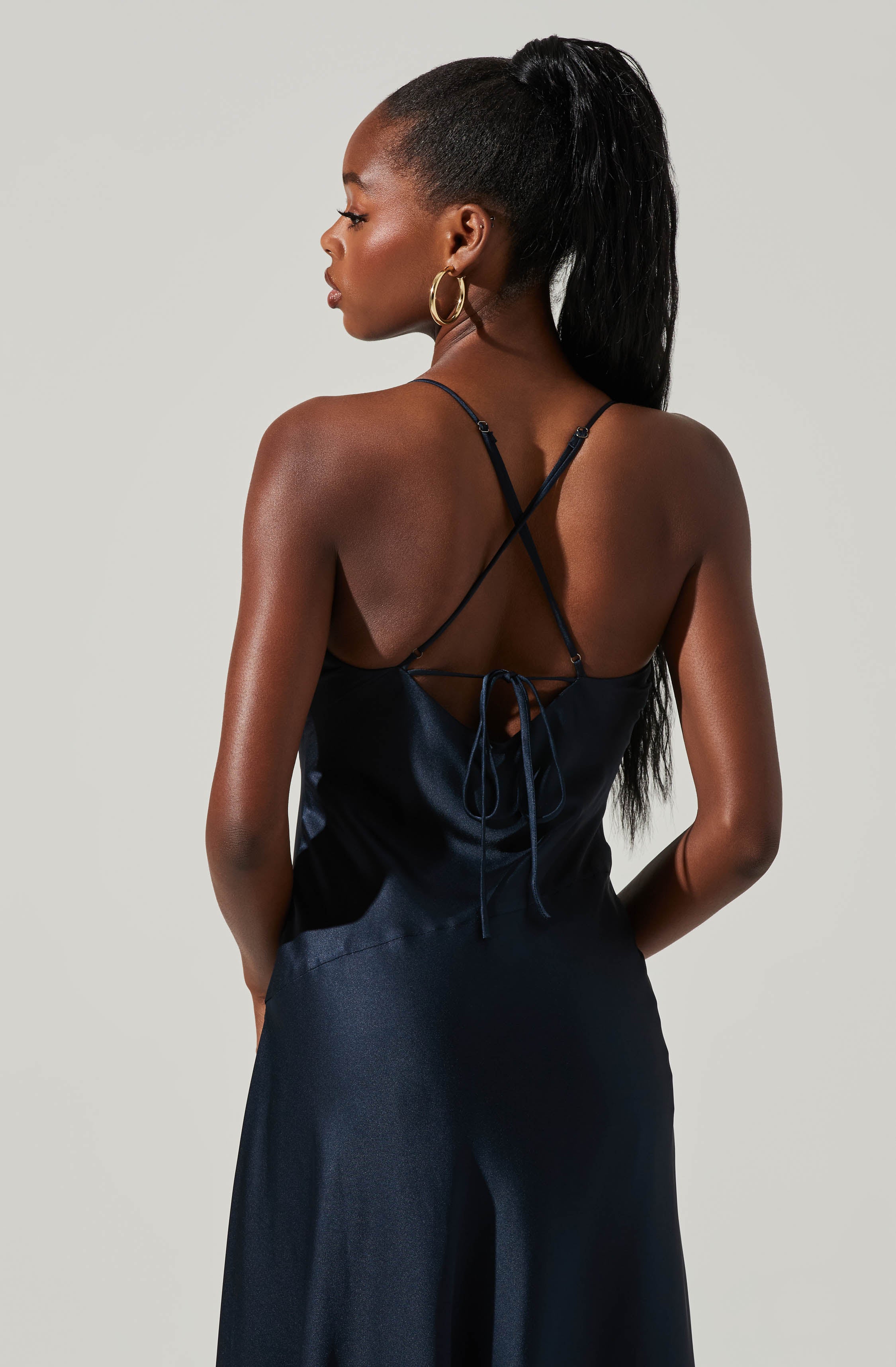 Cowl Sheath Dress - This dress is surely one of the more fashion forward options for your wardrobe. It flaunts an enticing cowl neck. Put together an elegant look, wearing this dress with a pair of pumps and accessorizing with a shoulder bag.