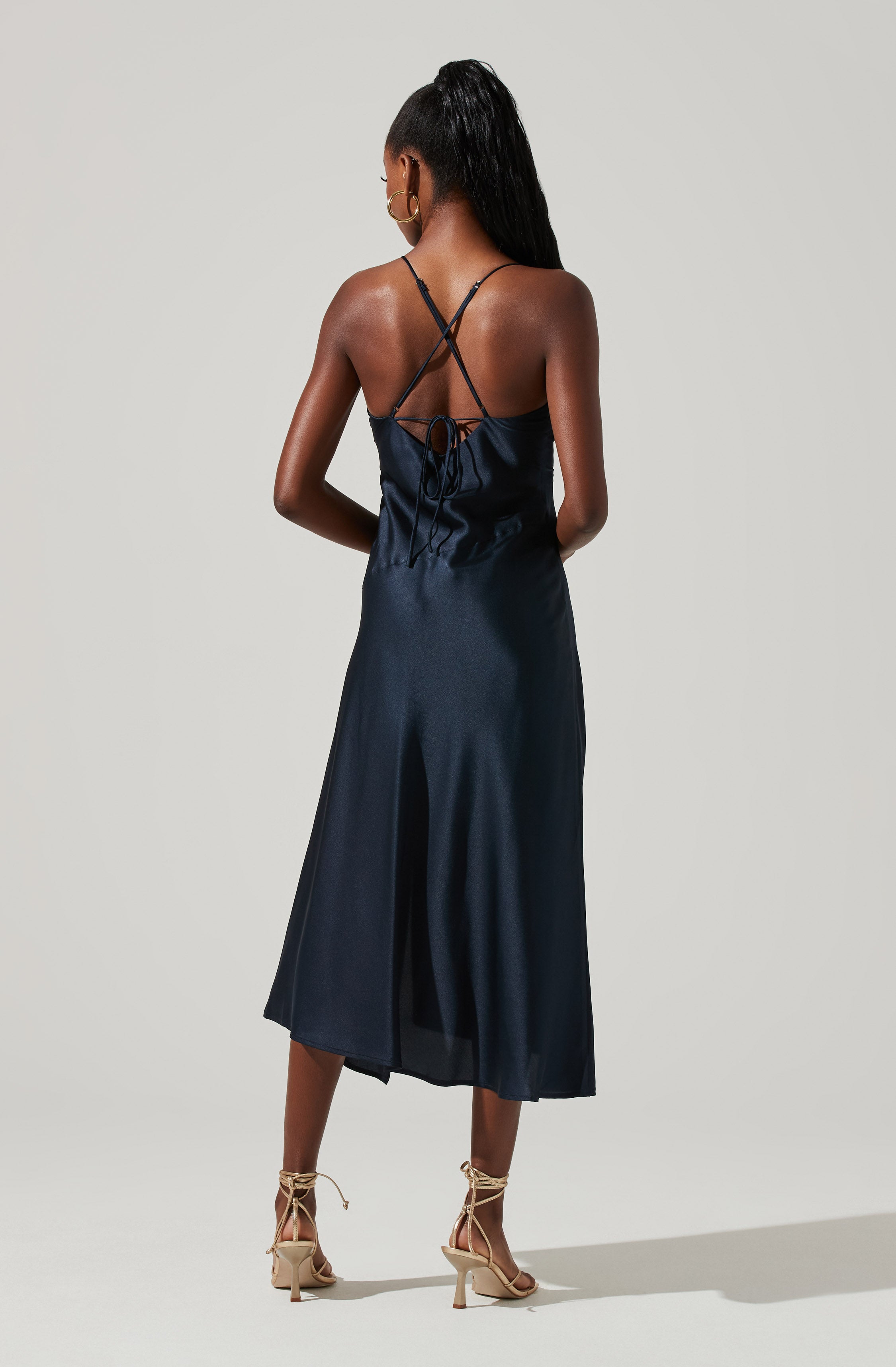 Cowl Sheath Dress - This dress is surely one of the more fashion forward options for your wardrobe. It flaunts an enticing cowl neck. Put together an elegant look, wearing this dress with a pair of pumps and accessorizing with a shoulder bag.