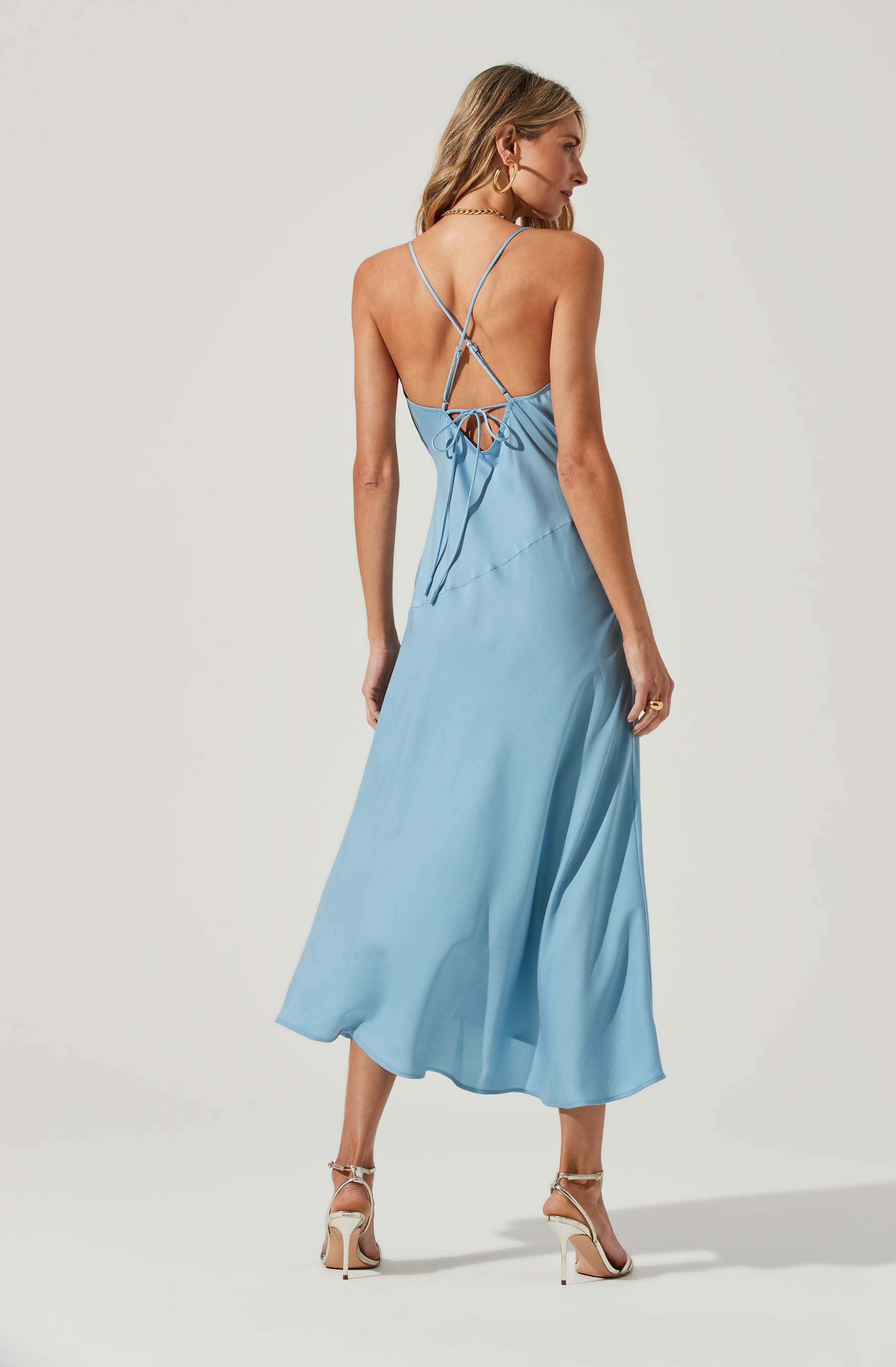 Solid Flare Dress - This dress is a cool option to pull off your holiday look. It flaunts a plunge neckline.