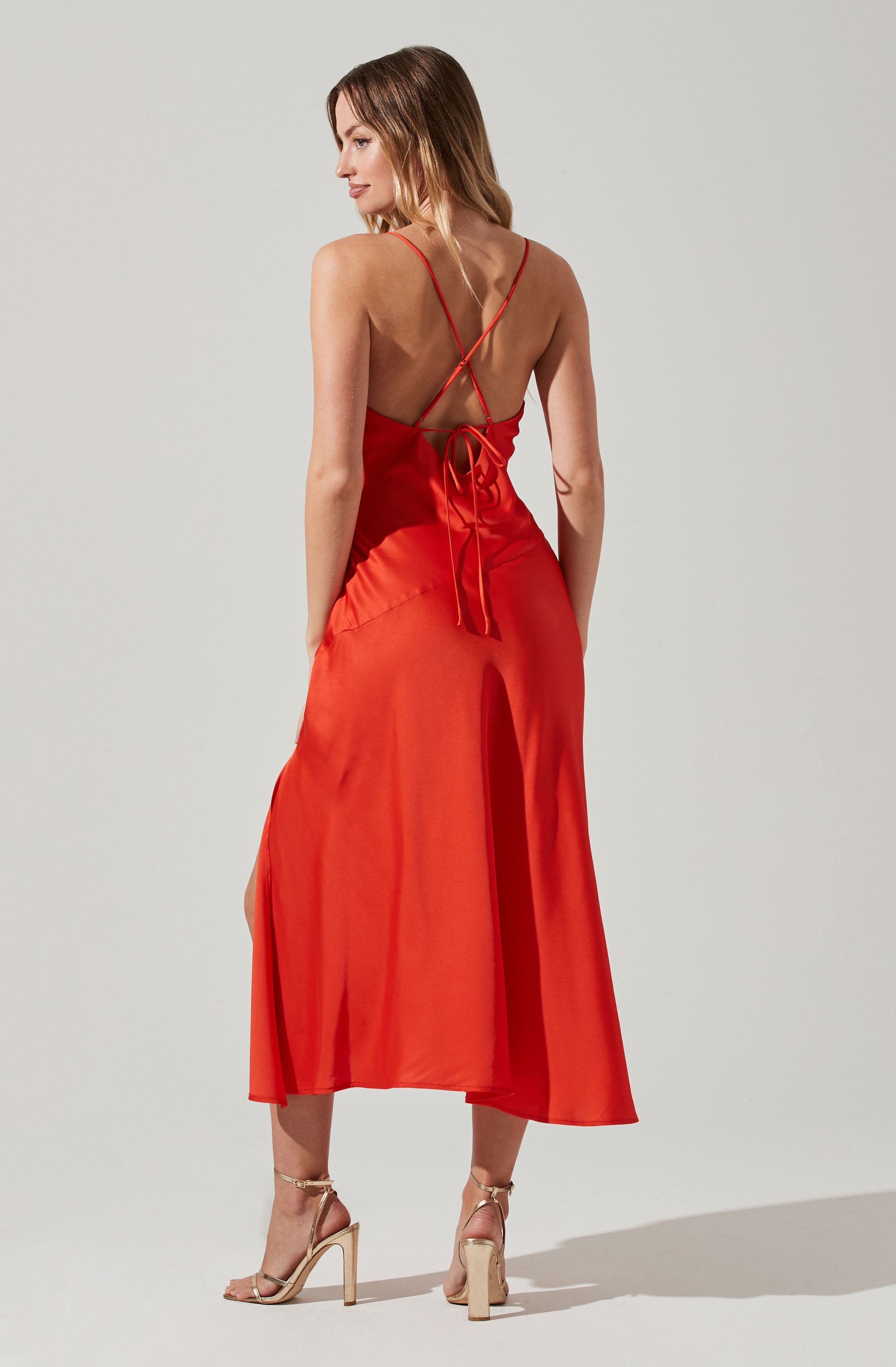 Sleeveless Flare Dress - This dress is a cool option to pull off your holiday look. It showcases a refined V-neck.