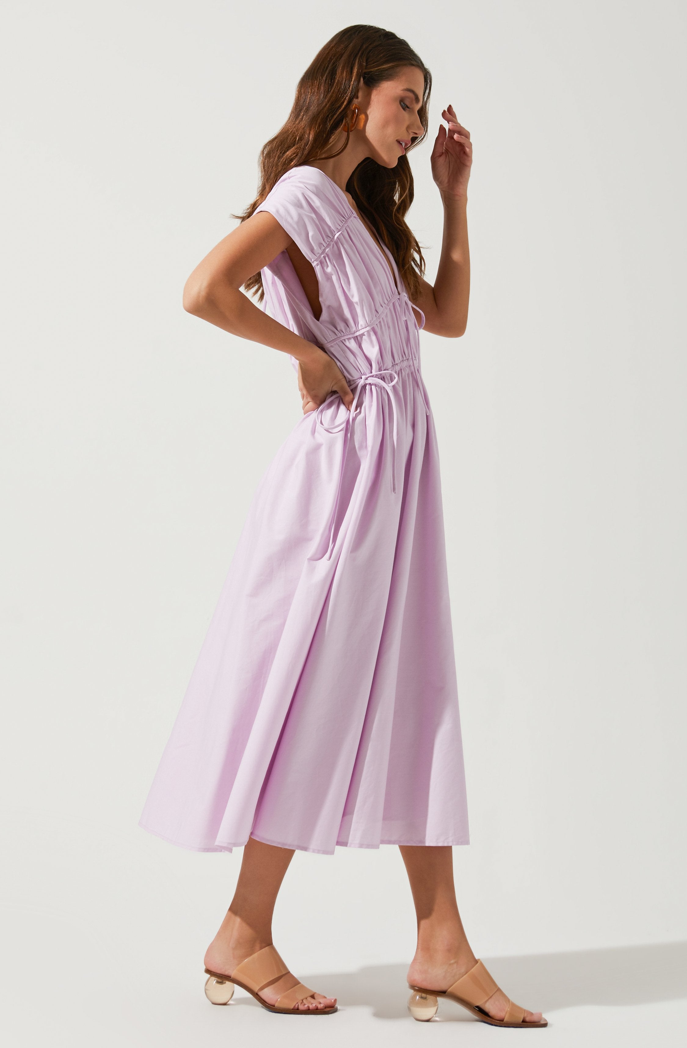 Solid Flare Dress - This dress is a cool option to pull off your holiday look. It lays emphasis on a stylish V-neck.