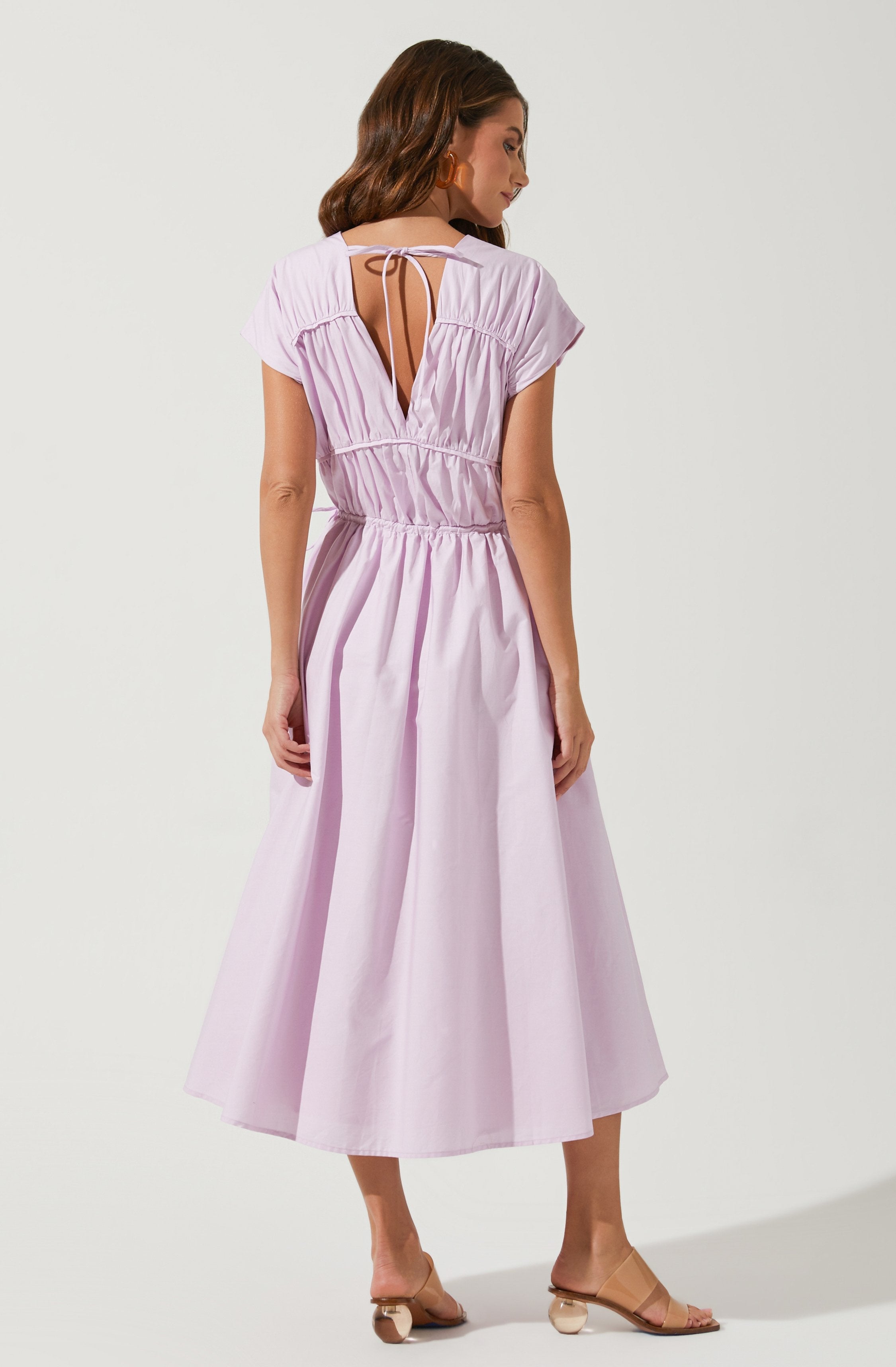 Solid Flare Dress - This dress is a cool option to pull off your holiday look. It lays emphasis on a stylish V-neck.