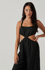 Black Scoop Neck Jumpsuit - When it comes to modish casual outfits, this jumpsuit guarantees a great look. It emphasizes a complementing scoop neck. It's bound to look great with a jacket and a pair of block heels.