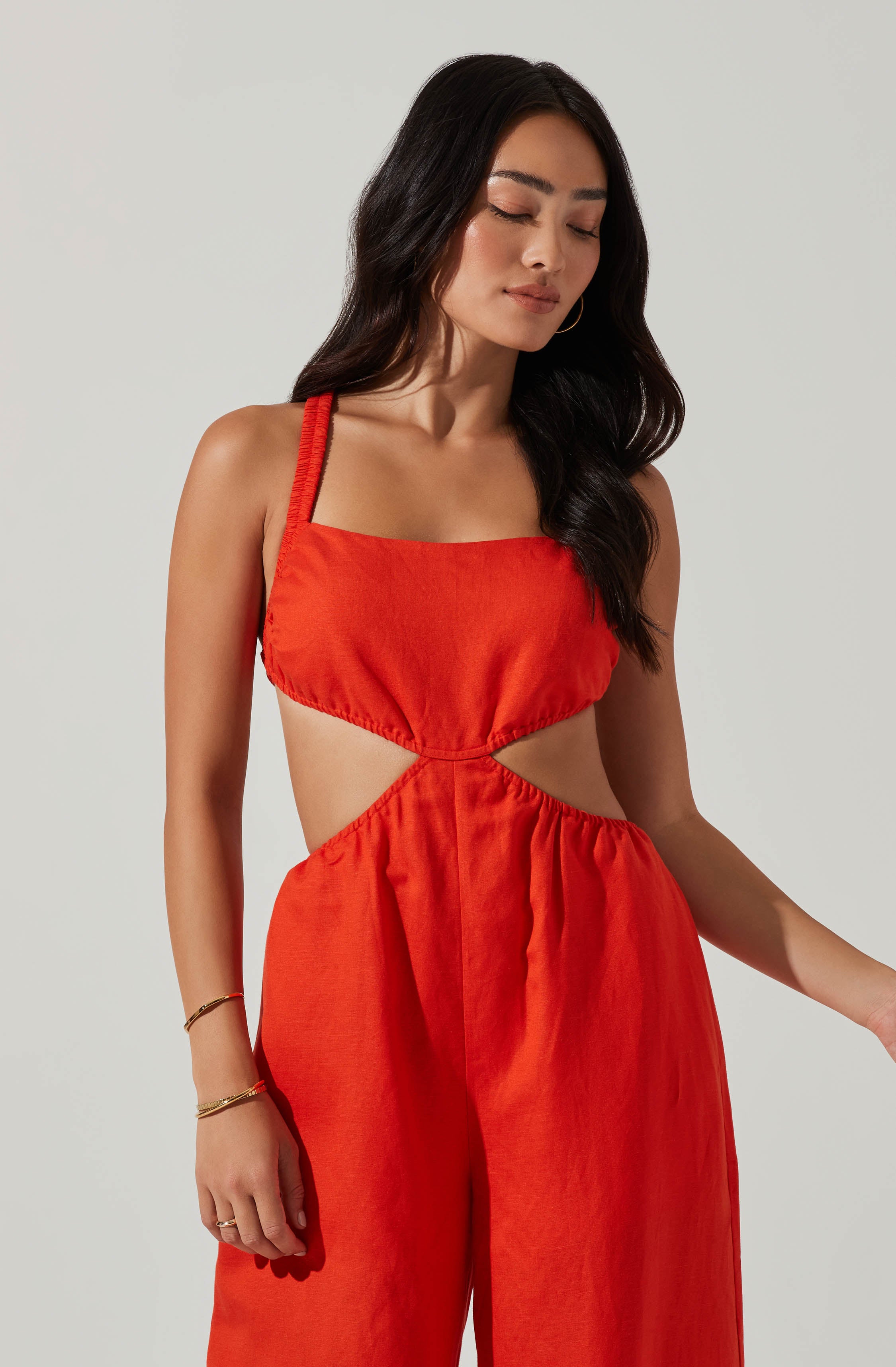 Red Split Neck Jumpsuit - This jumpsuit is an extremely stylish all-day outfit. This jumpsuit goes well with a pair of suede pumps and an envelope clutch.