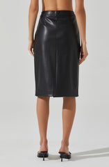 A person is wearing a black leather midi skirt that is high-waisted and fitted through the hips, with a straight, slightly A-line silhouette. They are also wearing black high-heeled shoes.