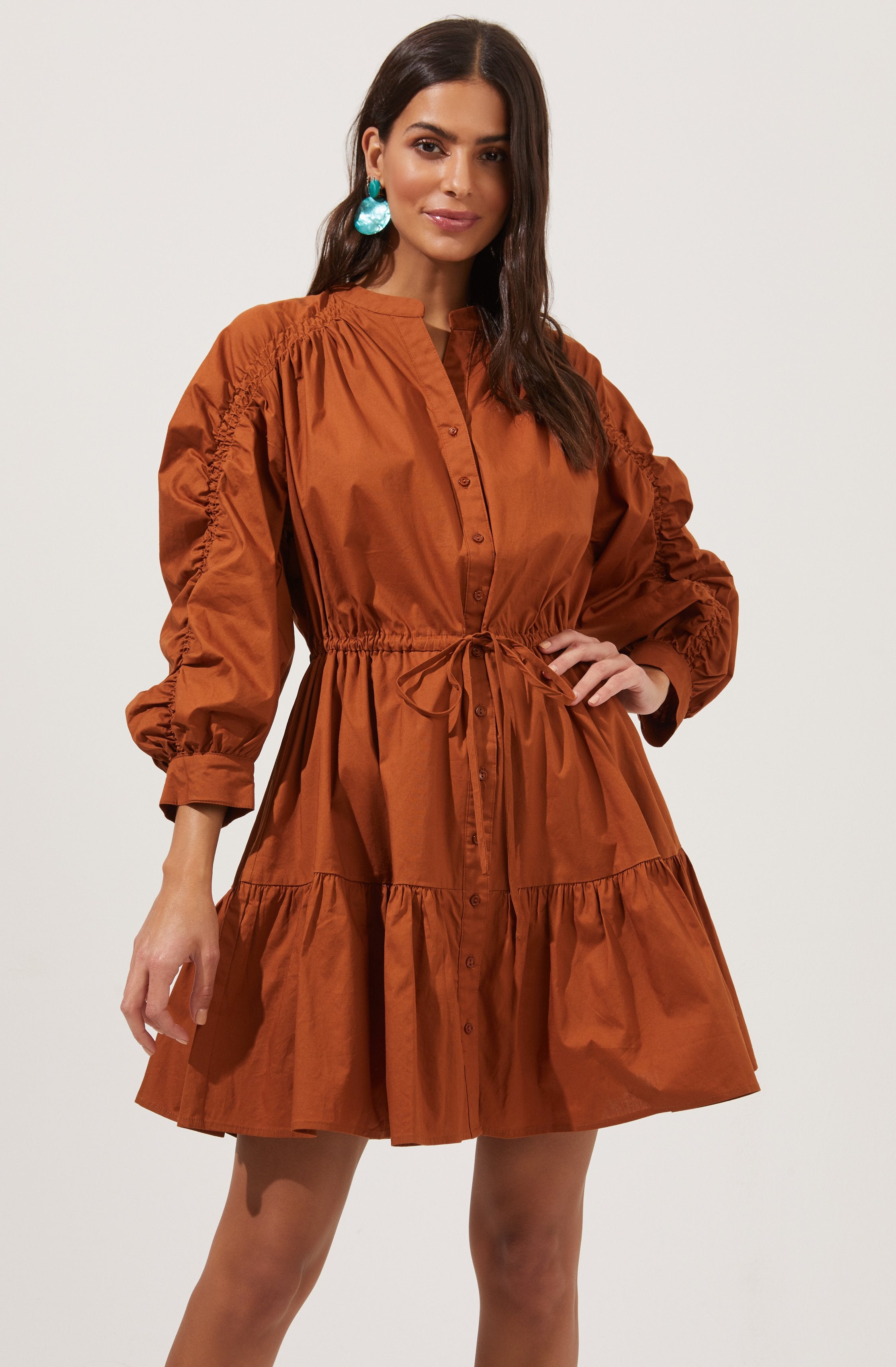 Solid Flare Dress - This dress is ideal for a summer brunch. It features a highneck that adds to its charm.
