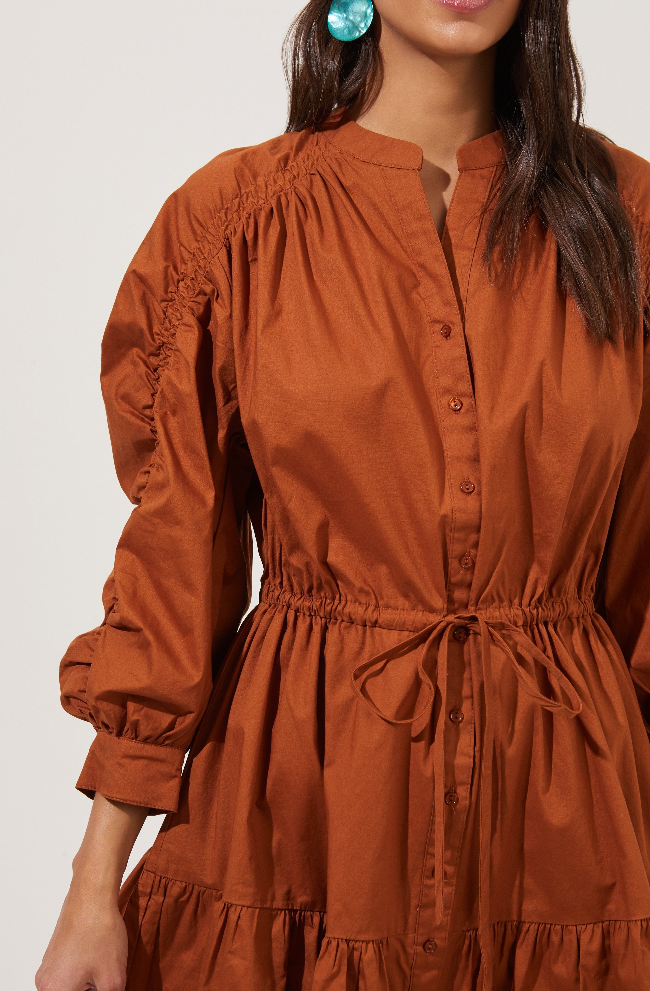 Solid Flare Dress - This dress is ideal for a summer brunch. It features a highneck that adds to its charm.