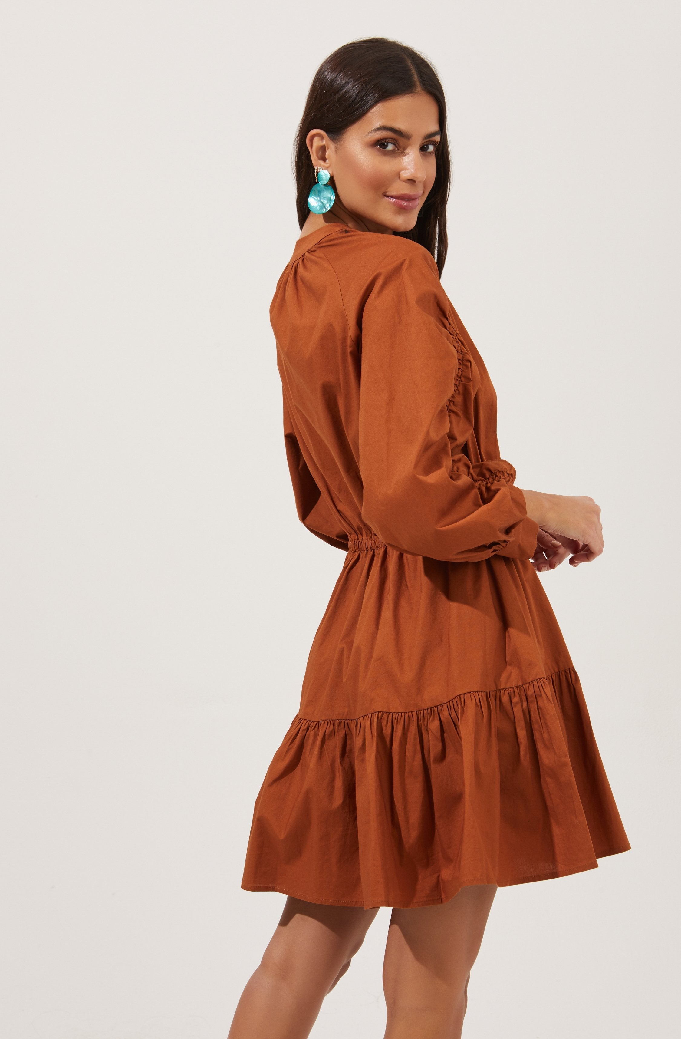 Solid Flare Dress - This dress is ideal for a summer brunch. It features a highneck that adds to its charm.