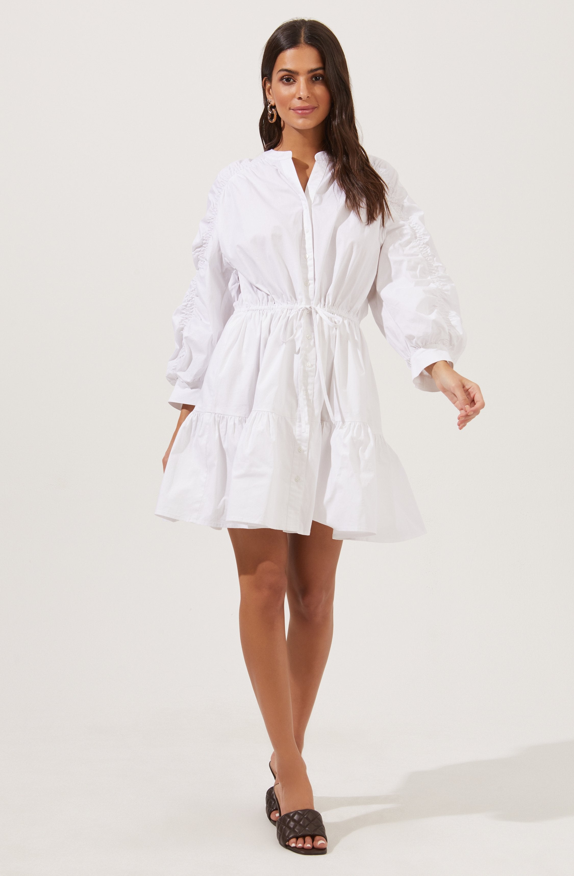 White Highneck Flare Dress - Brunch is all about dressing light without compromising on style, and this dress achieves both of those. It flaunts an elegant highneck.