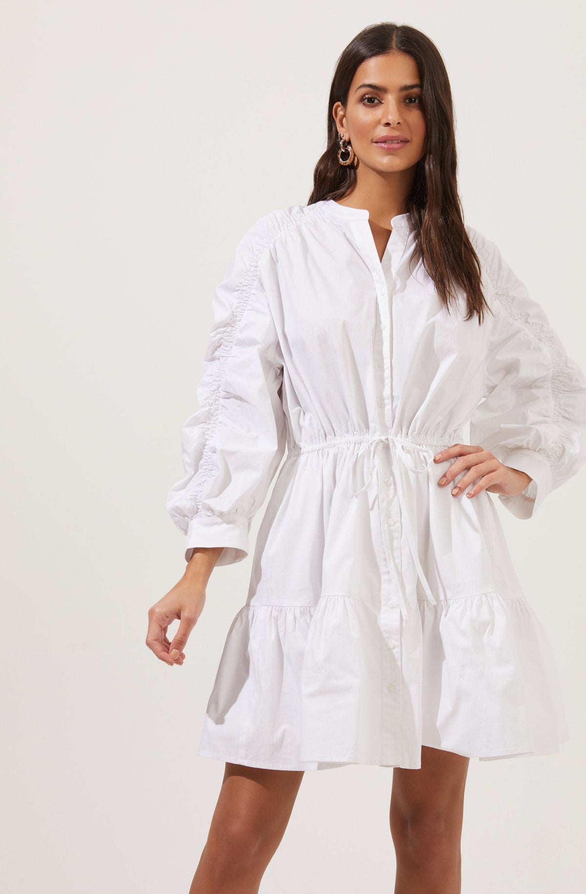 White Highneck Flare Dress - Brunch is all about dressing light without compromising on style, and this dress achieves both of those. It flaunts an elegant highneck.