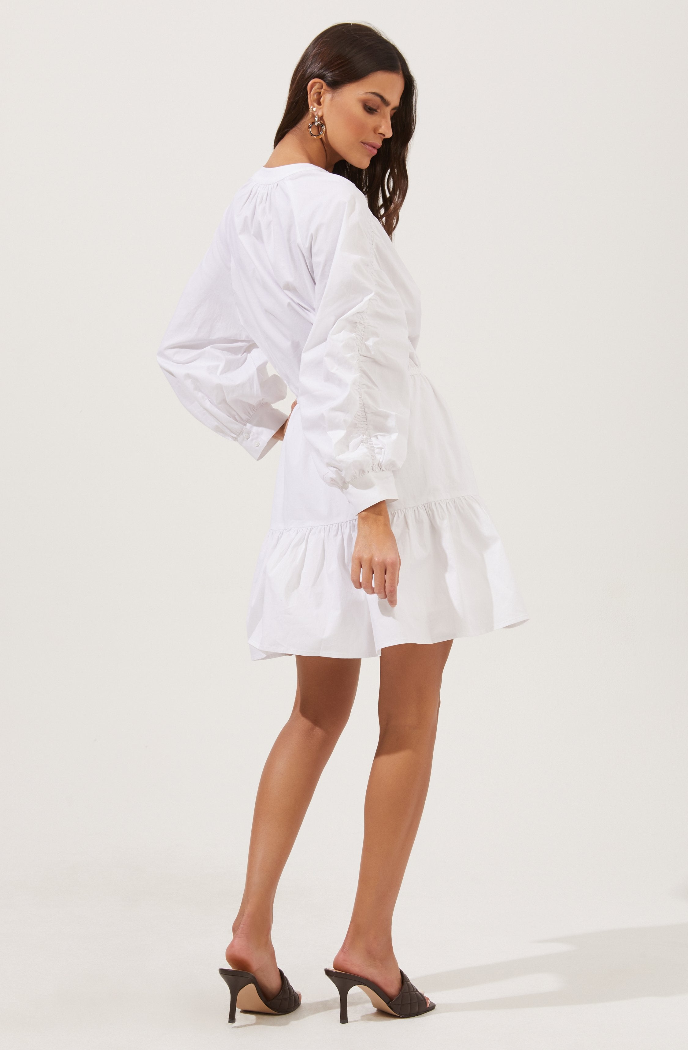 White Highneck Flare Dress - Brunch is all about dressing light without compromising on style, and this dress achieves both of those. It flaunts an elegant highneck.