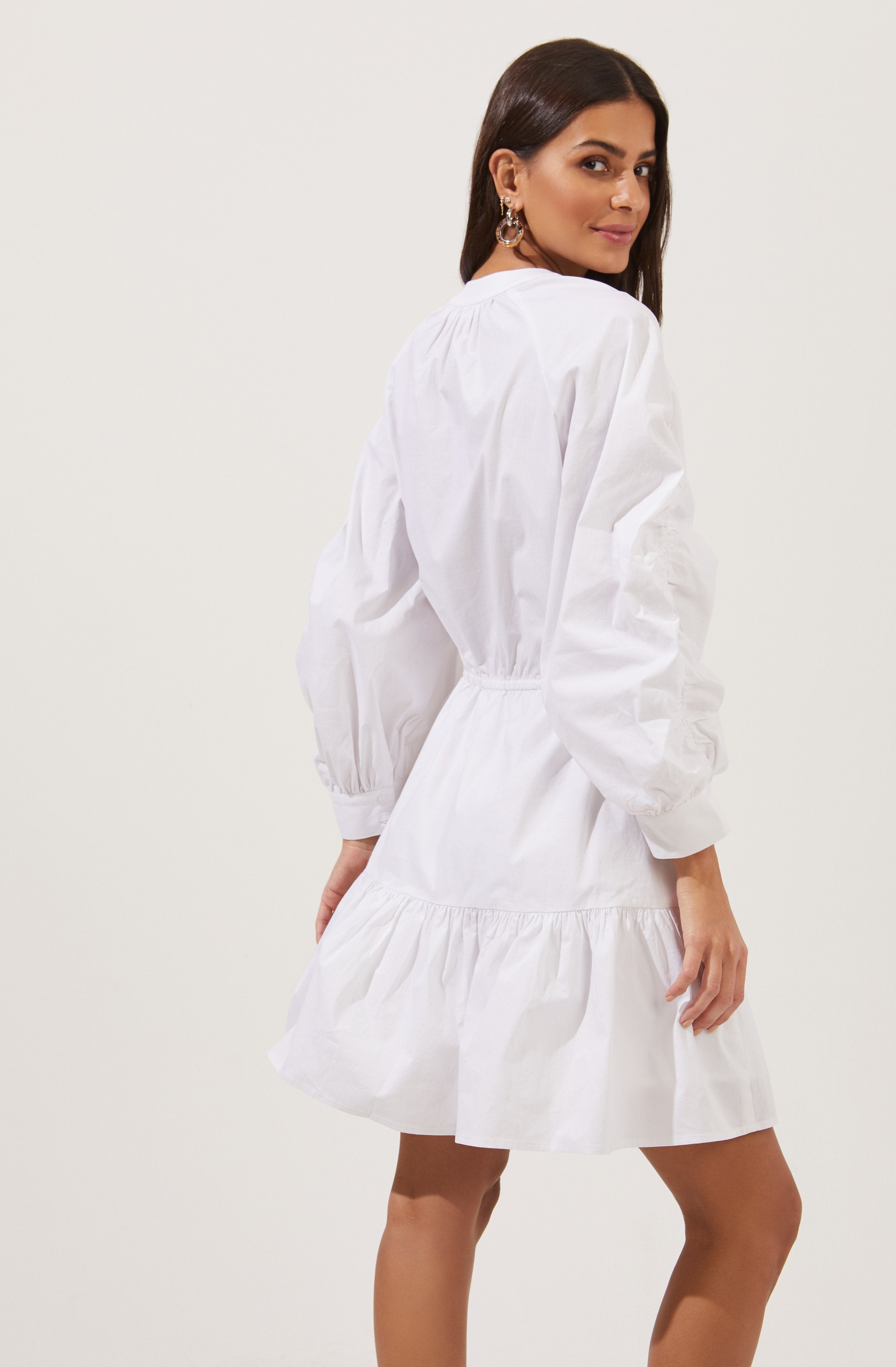 White Highneck Flare Dress - Brunch is all about dressing light without compromising on style, and this dress achieves both of those. It flaunts an elegant highneck.