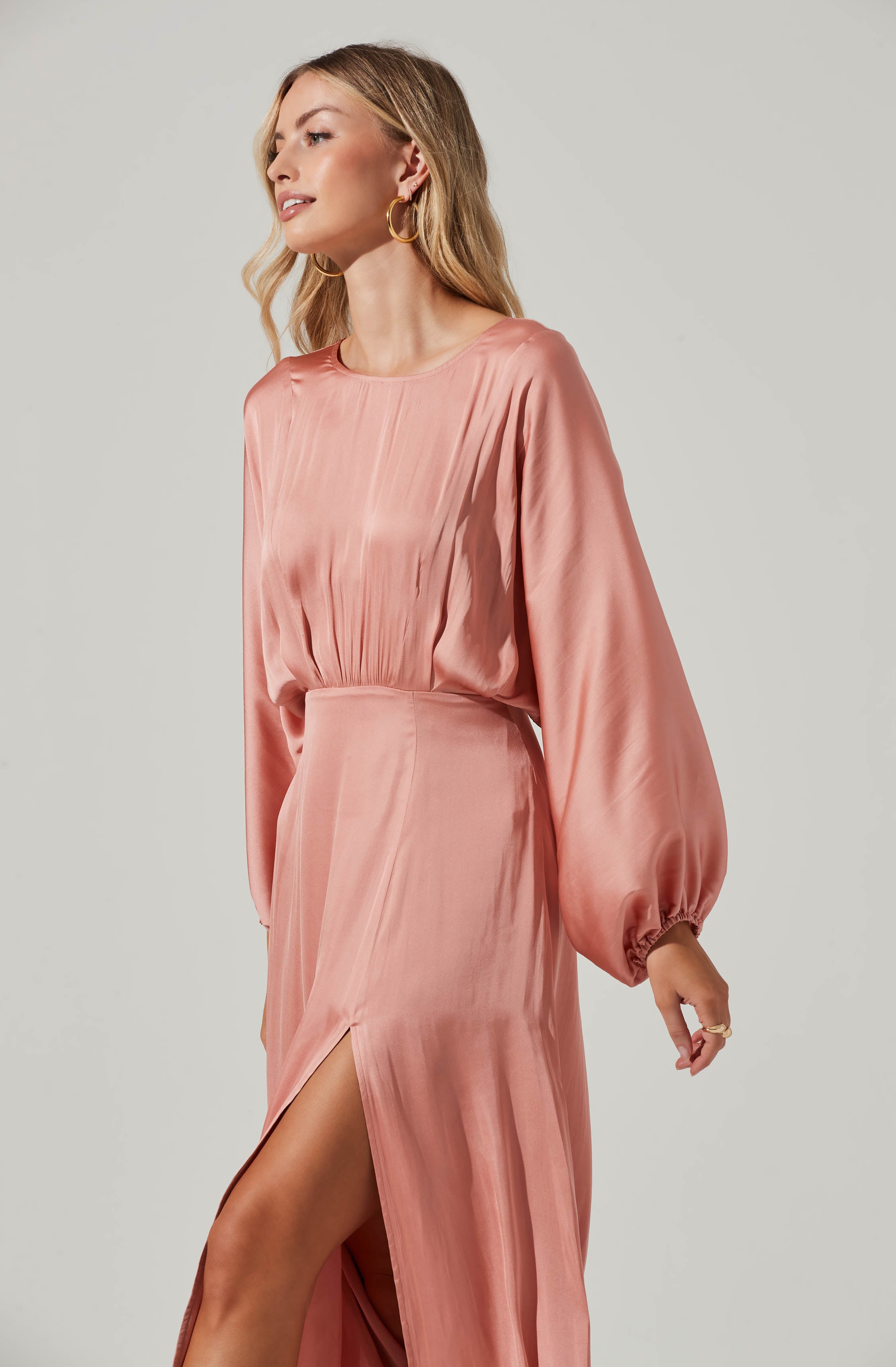 Long Sleeve Mermaid Dress - This dress is ideal for a summer brunch. It emphasizes a round neckline. This dress goes really well with a pair of ankle strap stilettos.
