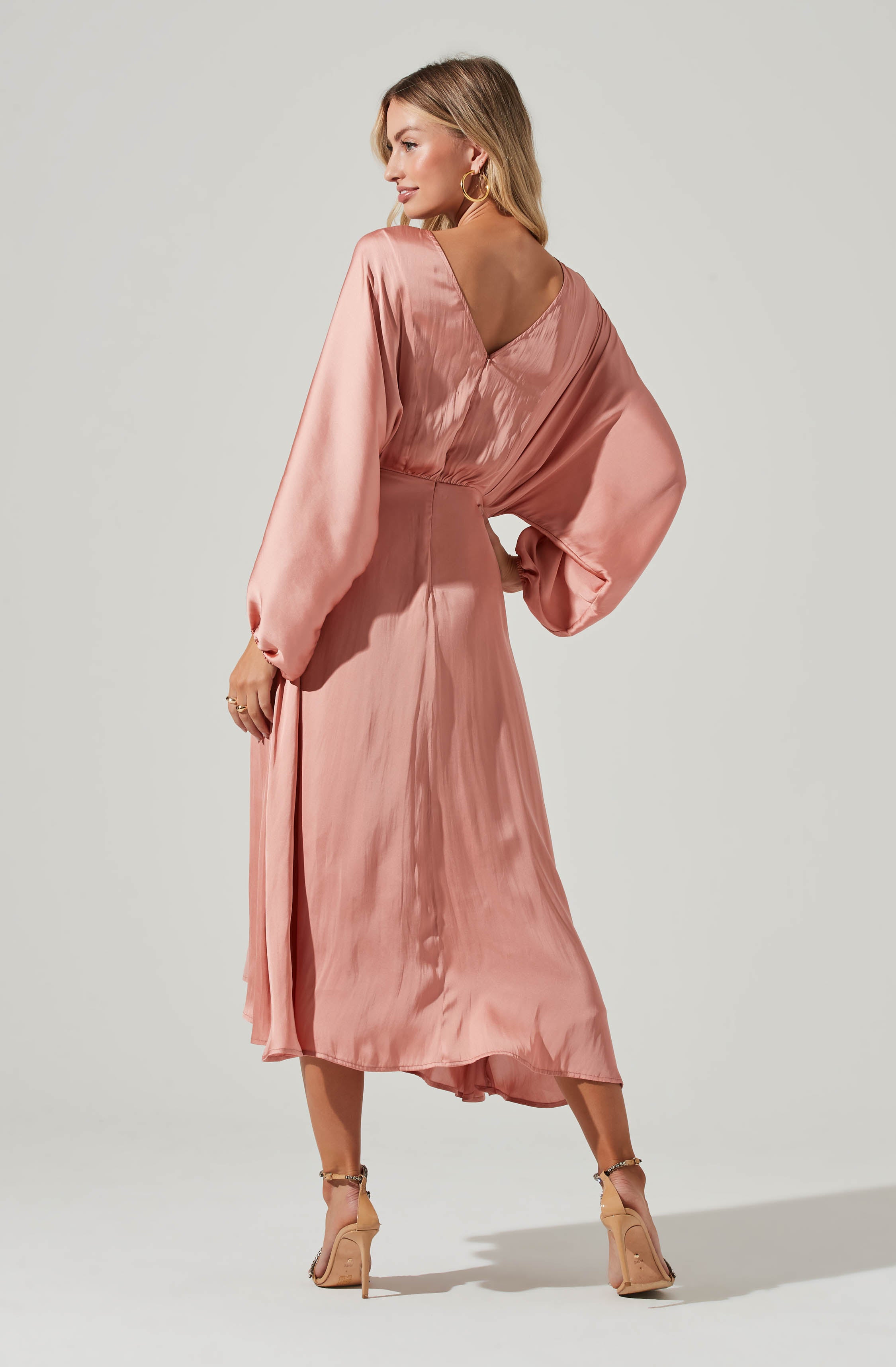 Long Sleeve Mermaid Dress - This dress is ideal for a summer brunch. It emphasizes a round neckline. This dress goes really well with a pair of ankle strap stilettos.
