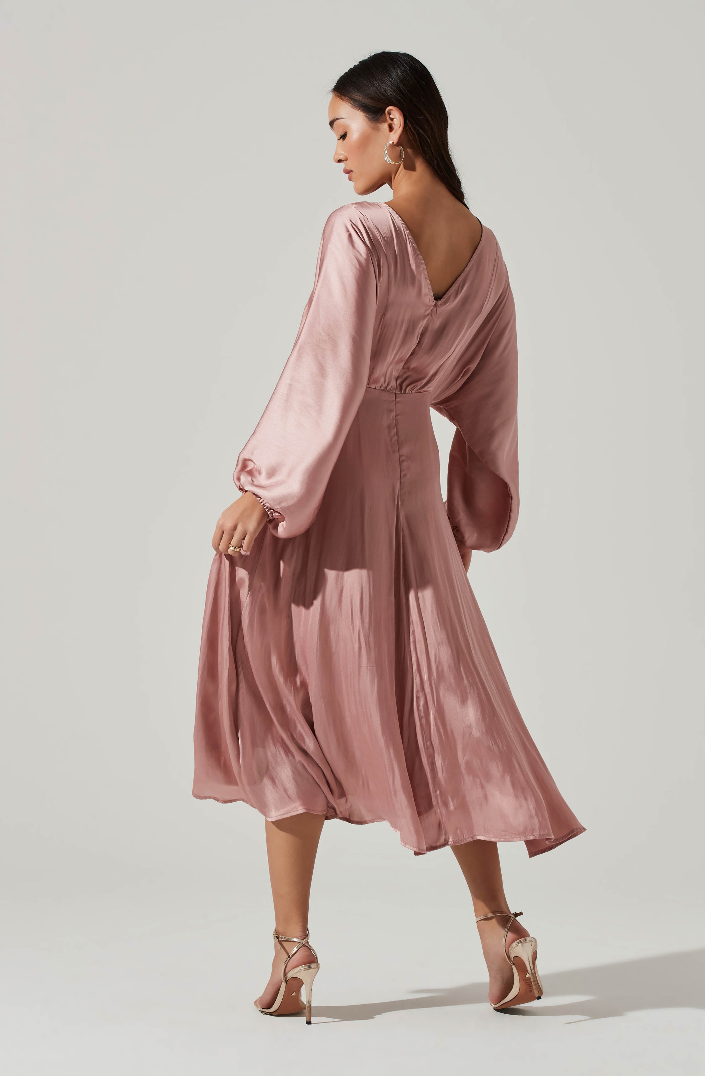 Brown Flare Dress - Brunch is all about dressing light without compromising on style, and this dress achieves both of those. It has a stylish V-neck.