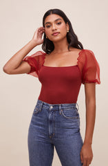 Square Neck Blouse - This is an outfit that easily goes from morning coffee to post-work happy hour. It has a modish square neck. Team it up with a tight skirt for a daytime date look.