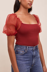 Square Neck Blouse - This is an outfit that easily goes from morning coffee to post-work happy hour. It has a modish square neck. Team it up with a tight skirt for a daytime date look.