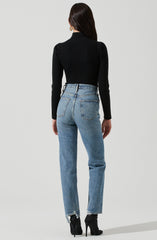 Light Rinse Jeans - It has a comfortably straight fit that goes well with jeans. The light wash also increases its style quotient. Opt for a quirky and casual look by pairing it with a bandage top and wedge sandals.