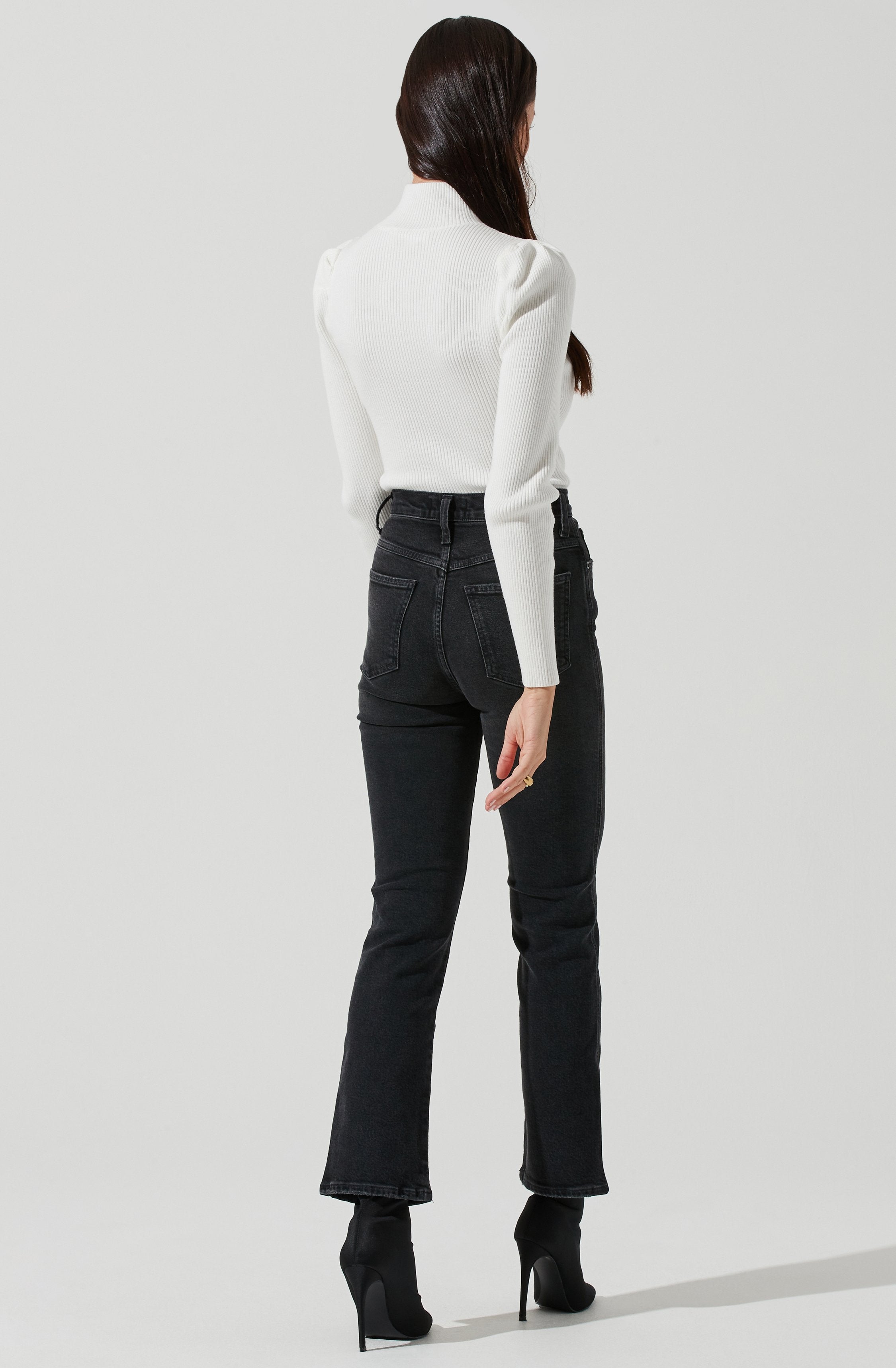 Grey Highneck Knit Top - This is a versatile piece that looks good all day long. It features a slender highneck.