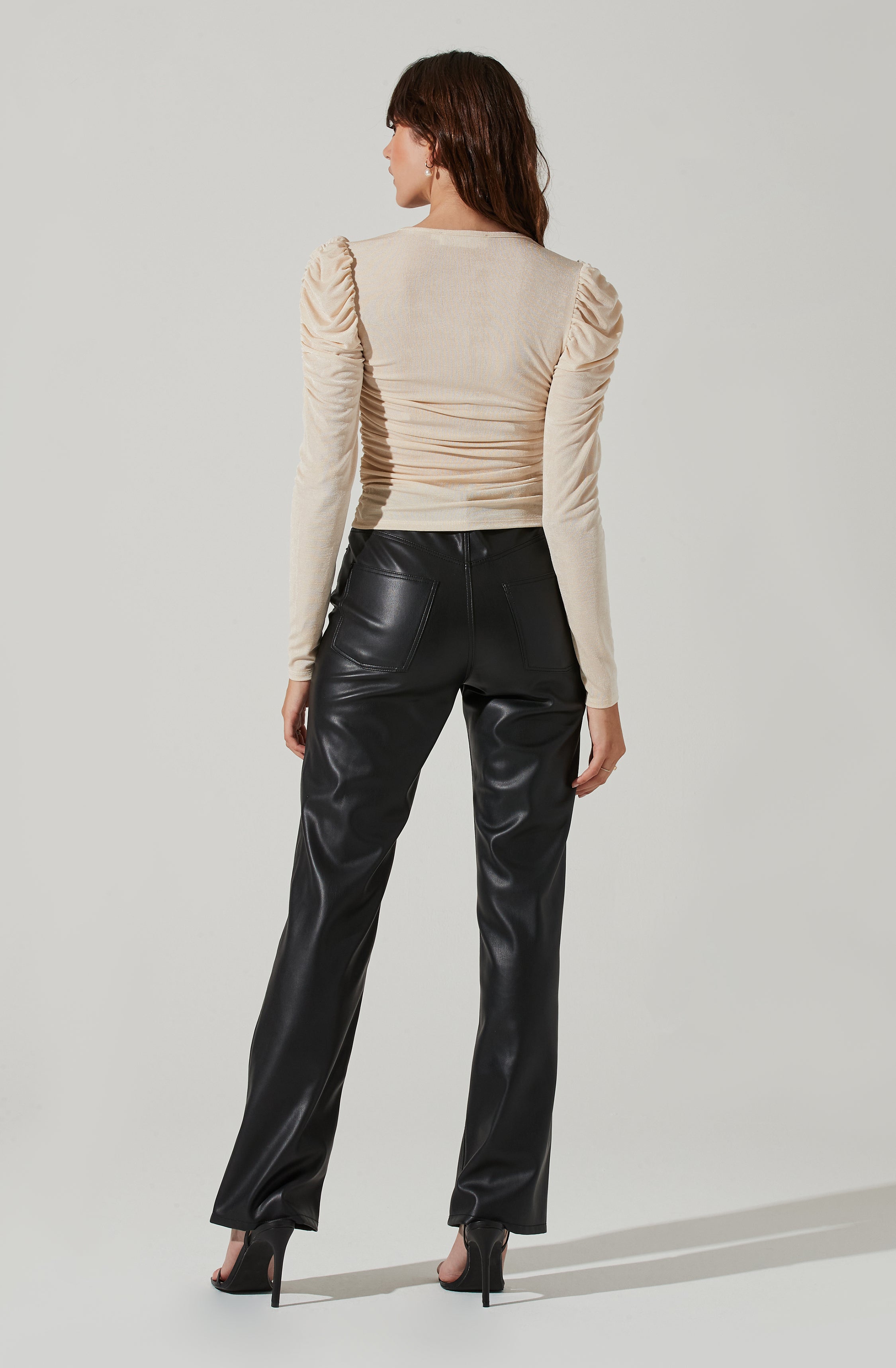 V-Neck Knit Top - This is an outfit that easily goes from morning coffee to post-work happy hour. It features a stylish V-neck.