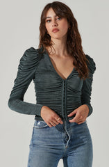 V-Neck Knit Top - This is a versatile piece that looks good all day long. It showcases a refined V-neck.