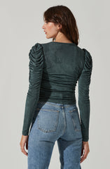 V-Neck Knit Top - This is a versatile piece that looks good all day long. It showcases a refined V-neck.