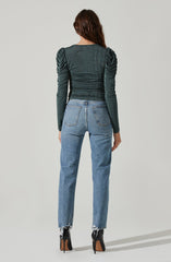 V-Neck Knit Top - This is a versatile piece that looks good all day long. It showcases a refined V-neck.