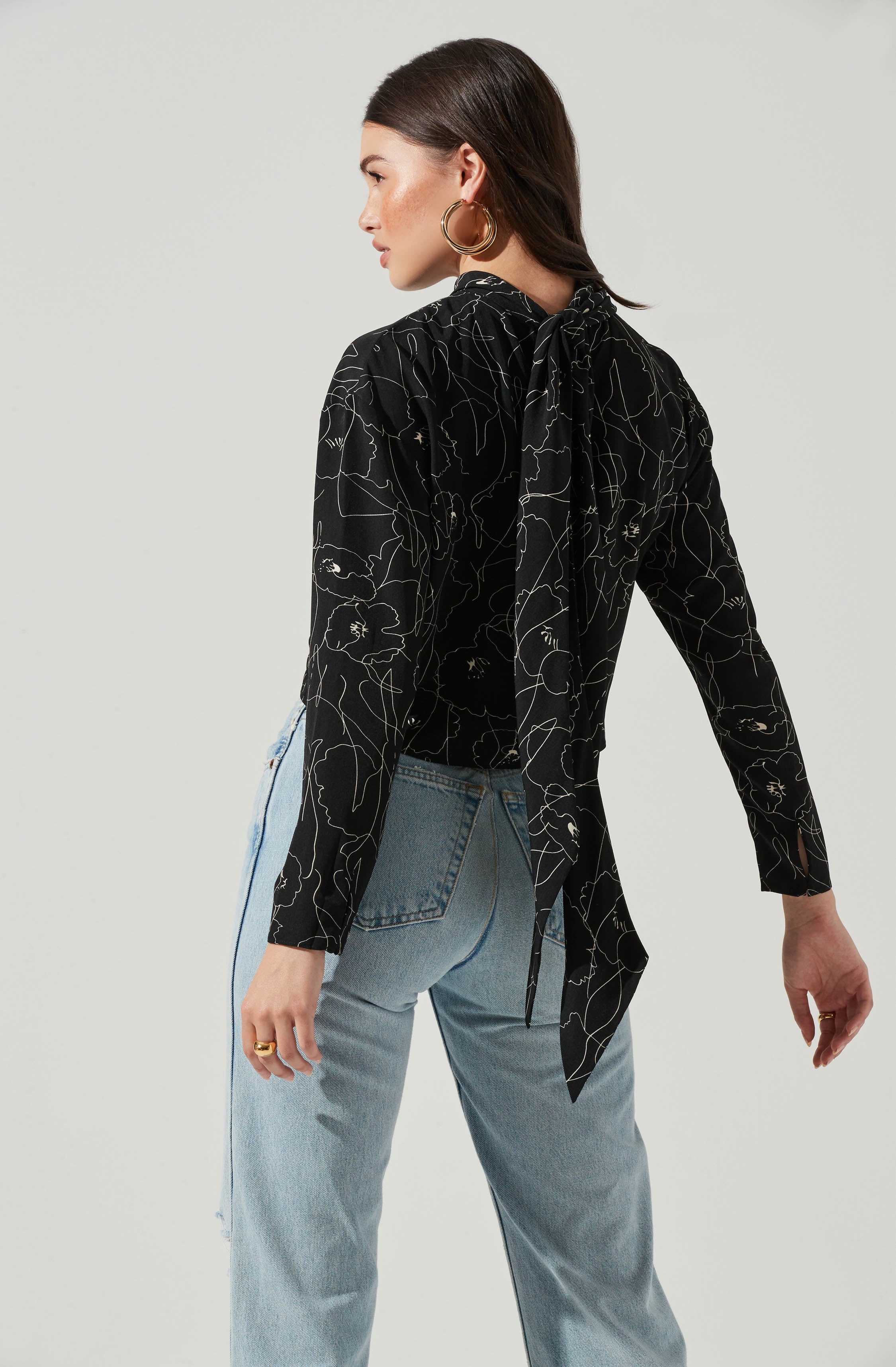 Black Highneck Blouse - This is a versatile piece that looks good all day long. It has a slender highneck. Pair it with culottes or distressed denim shorts.