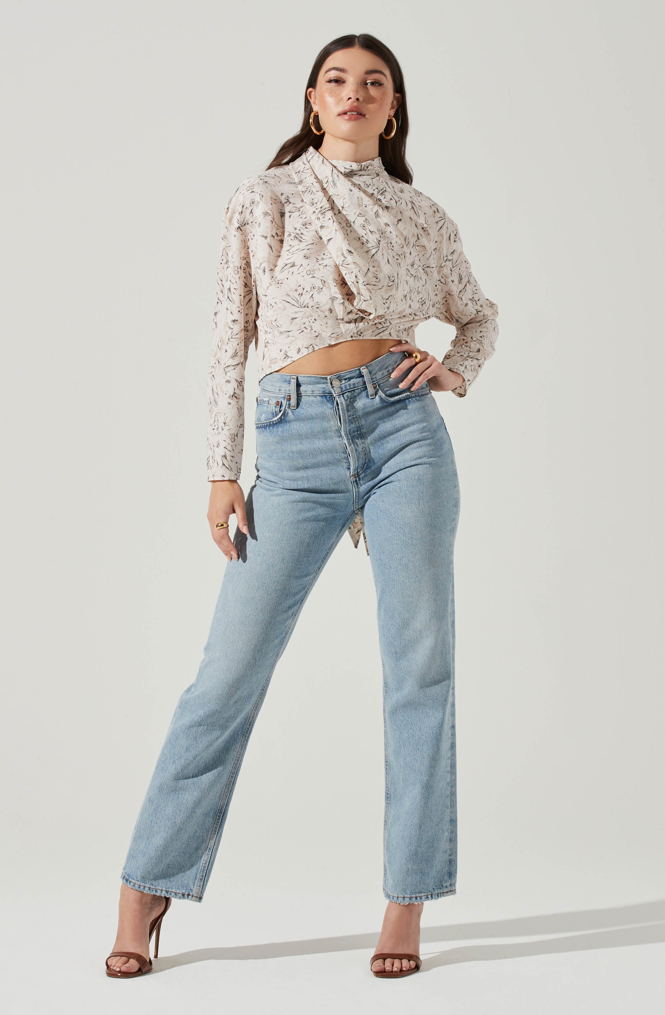 Black Highneck Blouse - This is a versatile piece that looks good all day long. It comes with a slender highneck. Team it up with a tight skirt for a daytime date look.
