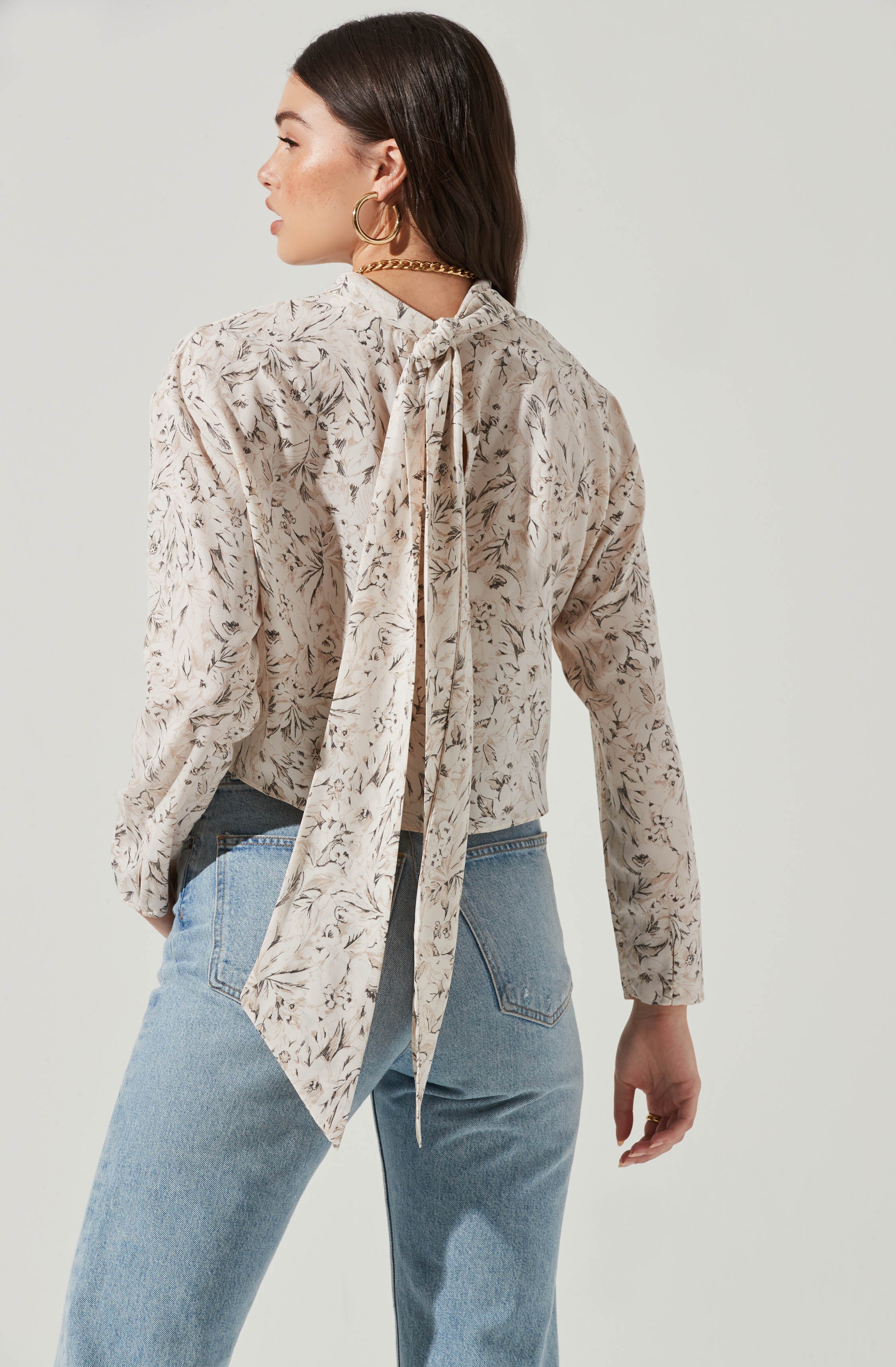 Black Highneck Blouse - This is a versatile piece that looks good all day long. It comes with a slender highneck. Team it up with a tight skirt for a daytime date look.