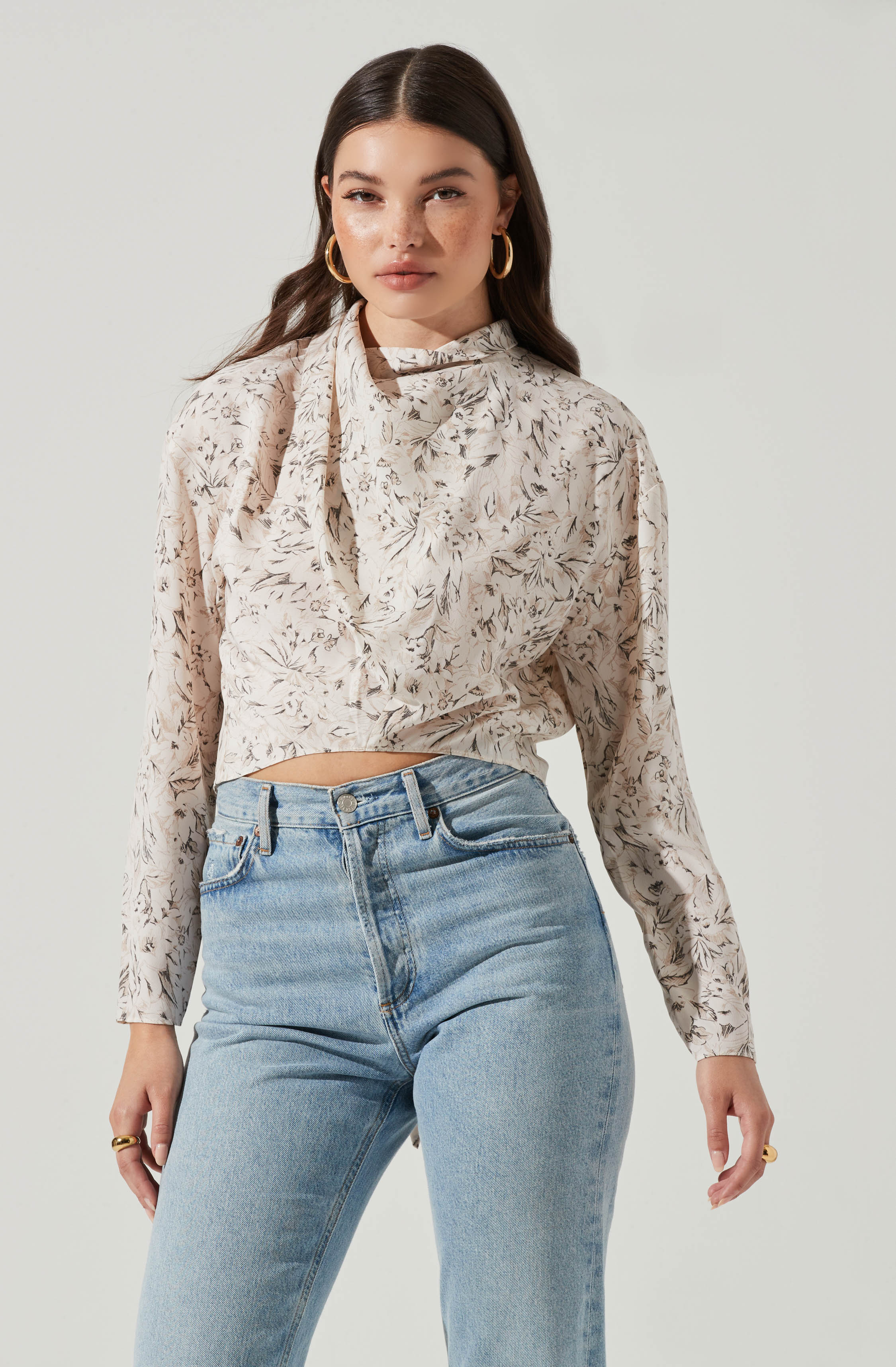 Black Highneck Blouse - This is a versatile piece that looks good all day long. It comes with a slender highneck. Team it up with a tight skirt for a daytime date look.