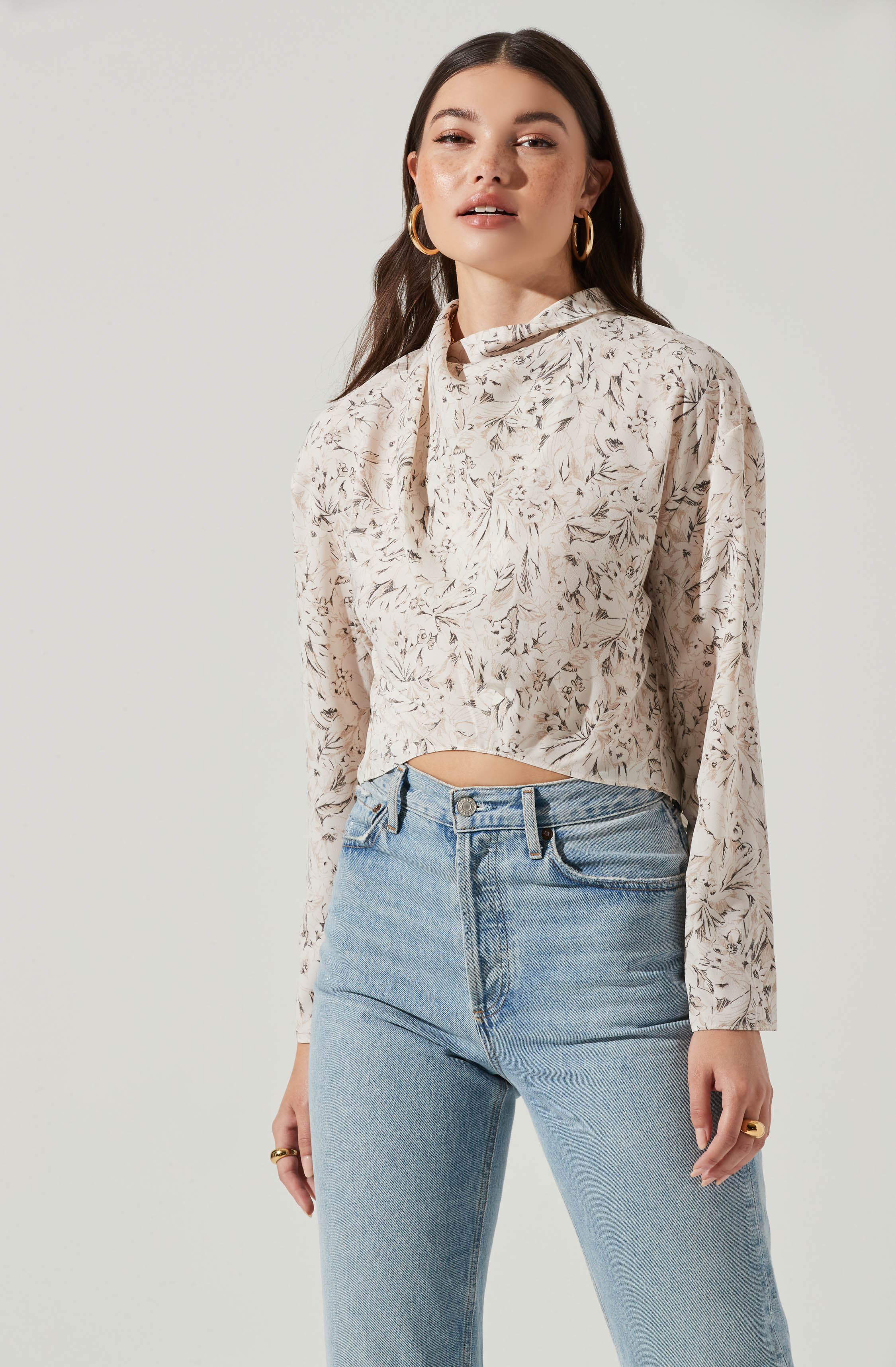 Black Highneck Blouse - This is a versatile piece that looks good all day long. It comes with a slender highneck. Team it up with a tight skirt for a daytime date look.