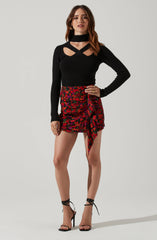 Highneck Knit Top - This is a versatile piece that looks good all day long. It features a slender highneck.