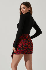 Highneck Knit Top - This is a versatile piece that looks good all day long. It features a slender highneck.