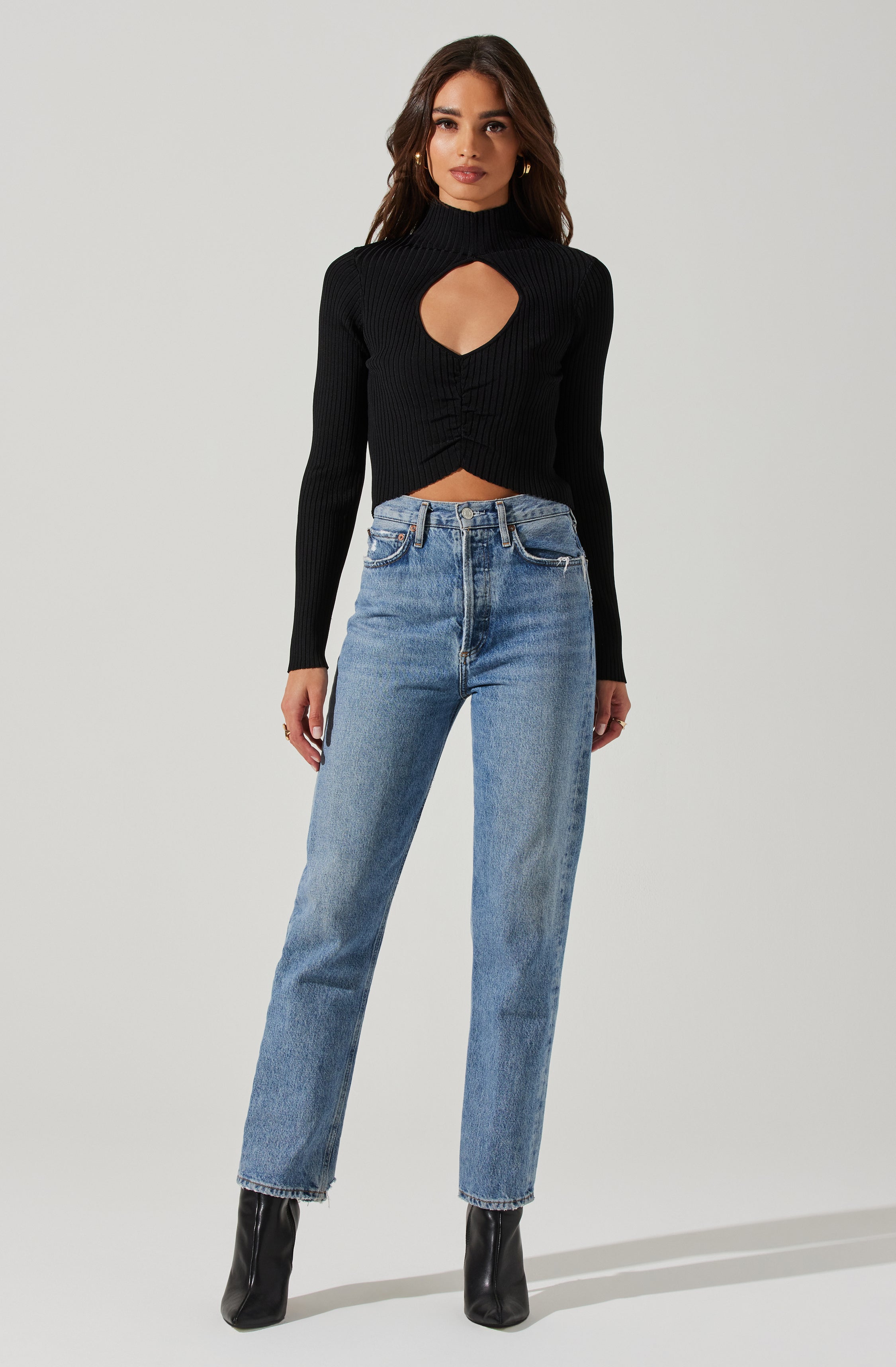 Highneck Knit Top - This is an outfit that easily goes from morning coffee to post-work happy hour. It emphasizes a slender highneck.