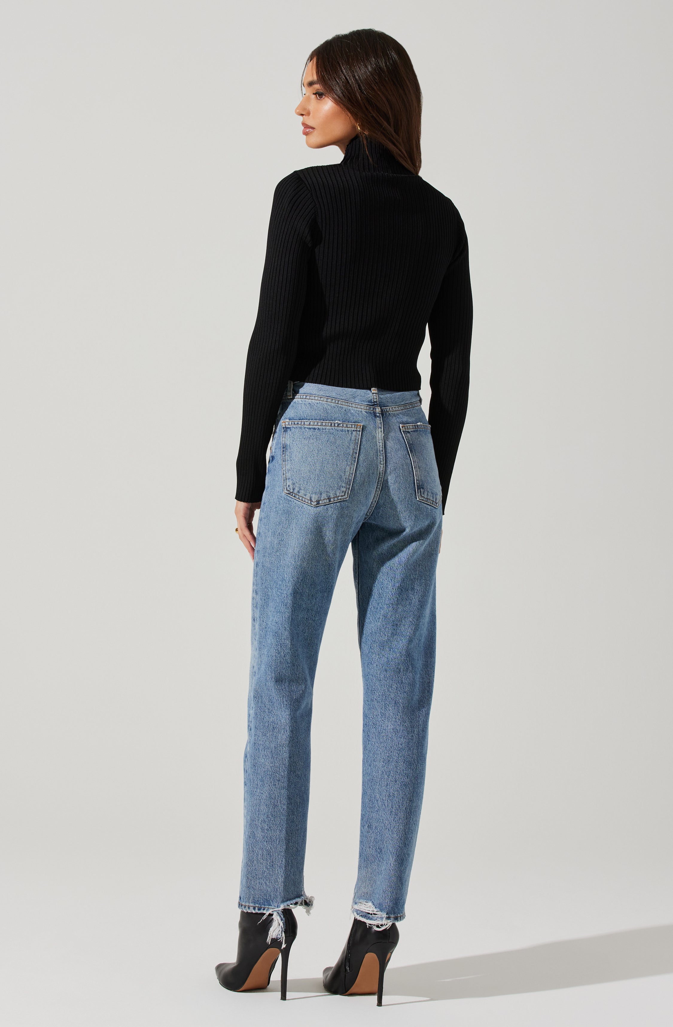 Highneck Knit Top - This is an outfit that easily goes from morning coffee to post-work happy hour. It emphasizes a slender highneck.